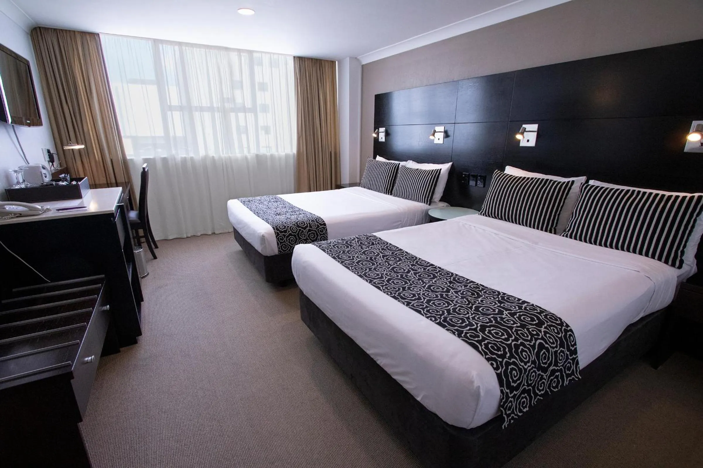 Bed in Mercure Wellington Abel Tasman