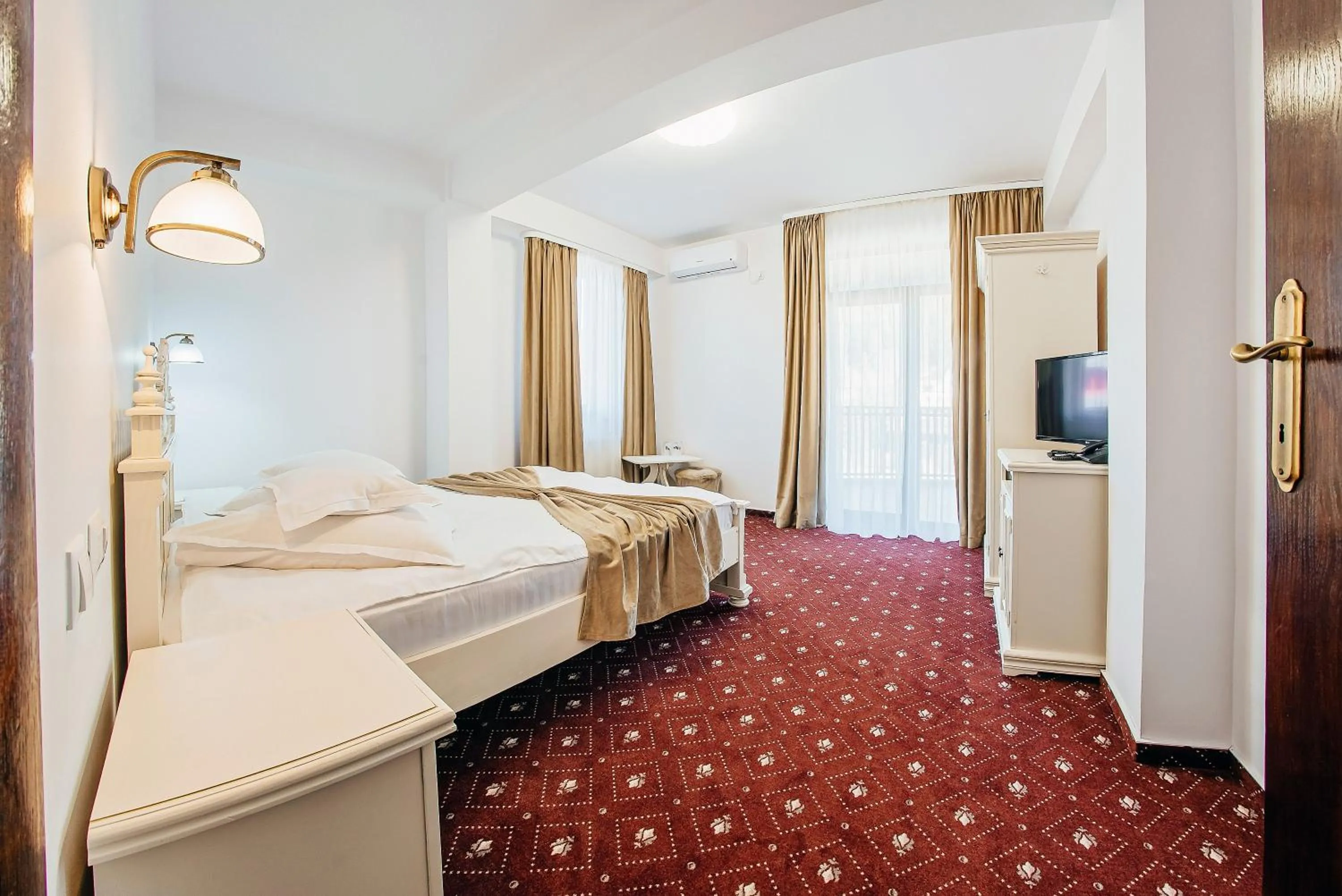 Communal lounge/ TV room, Bed in Pension Elegance