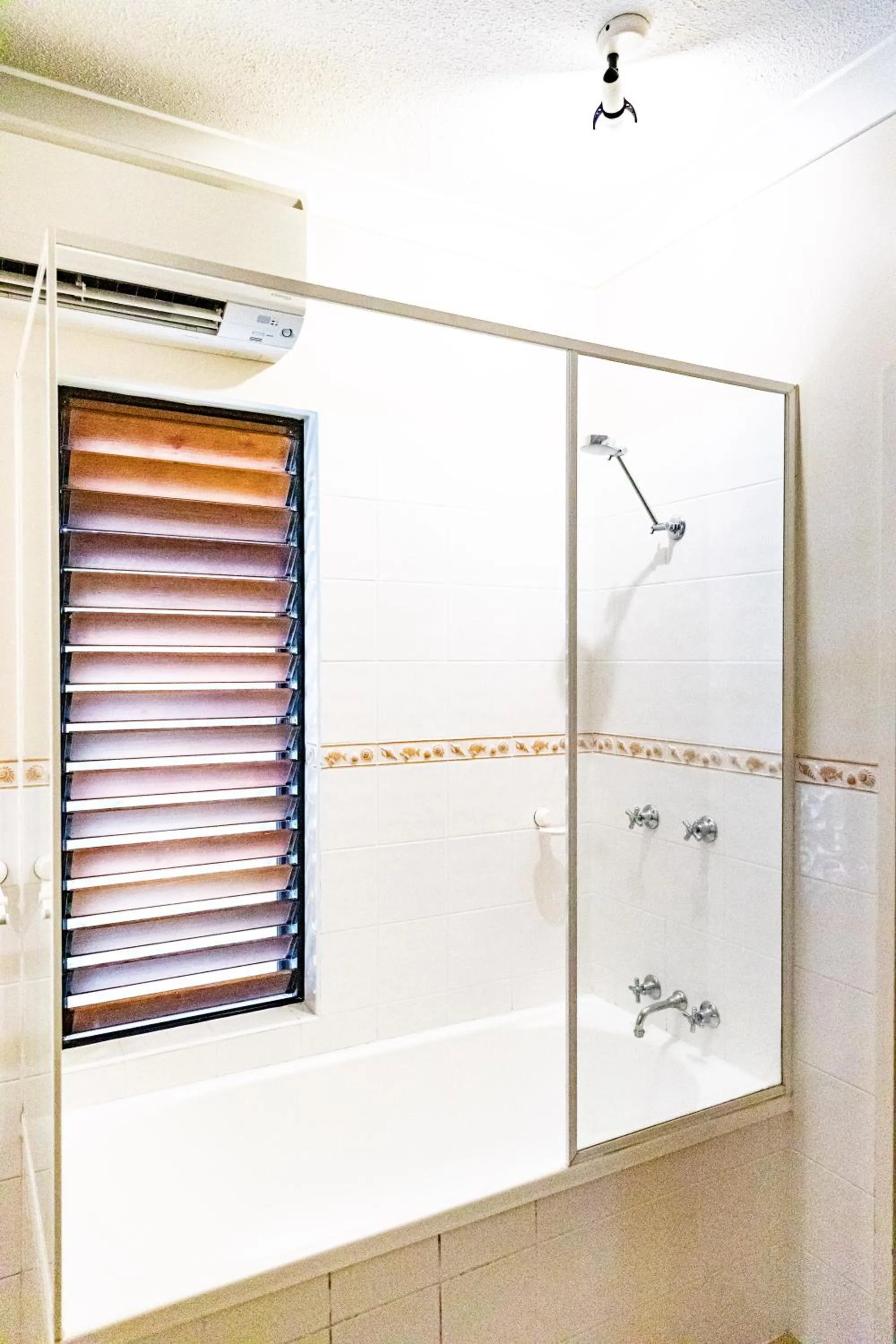 Shower in Hibiscus Resort & Spa - Official Onsite Reception & Check In