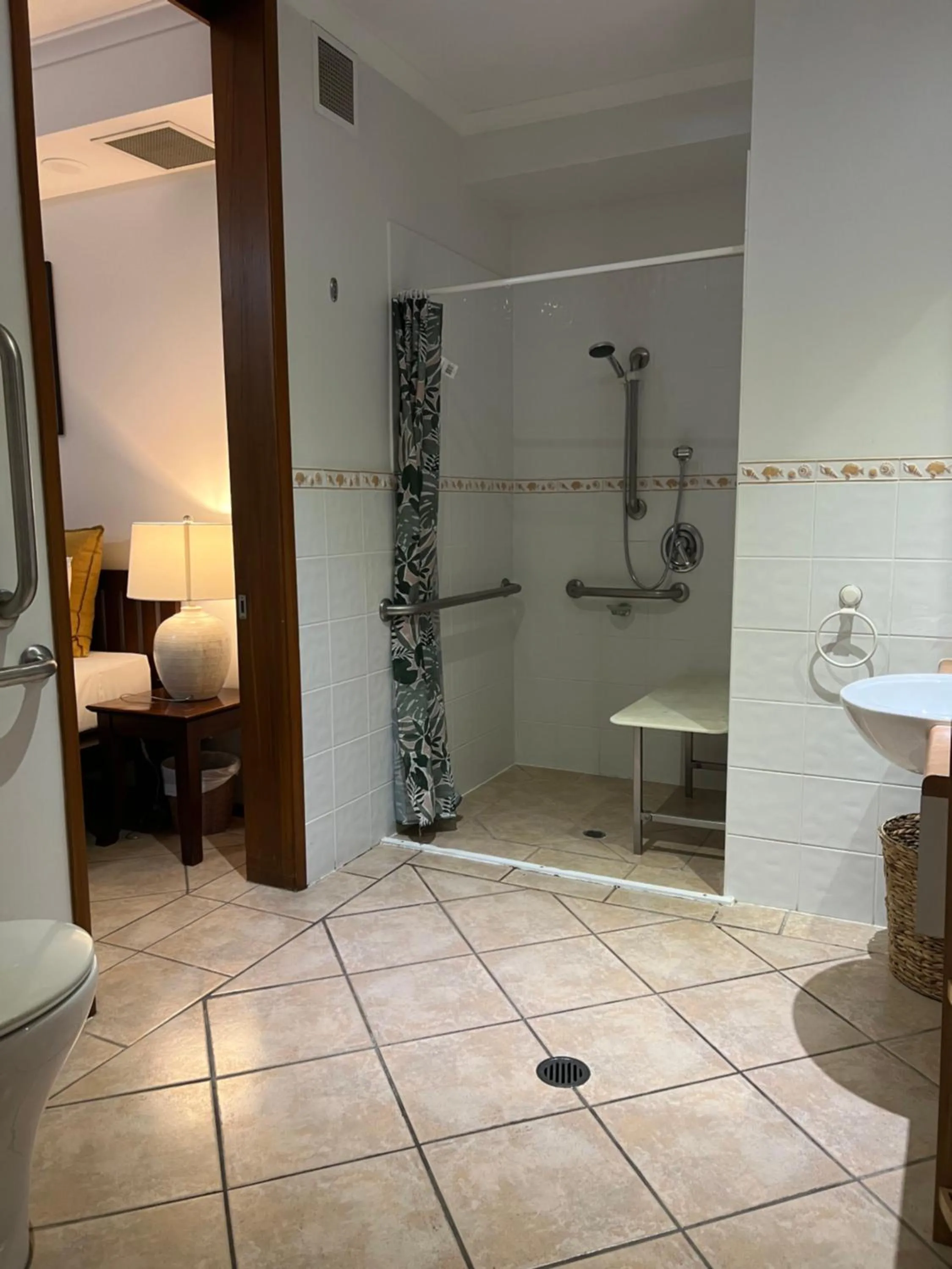 Shower in Hibiscus Resort & Spa - Official Onsite Reception & Check In