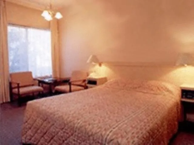 Bed in Clayton Monash Motor Inn & Serviced Apartments
