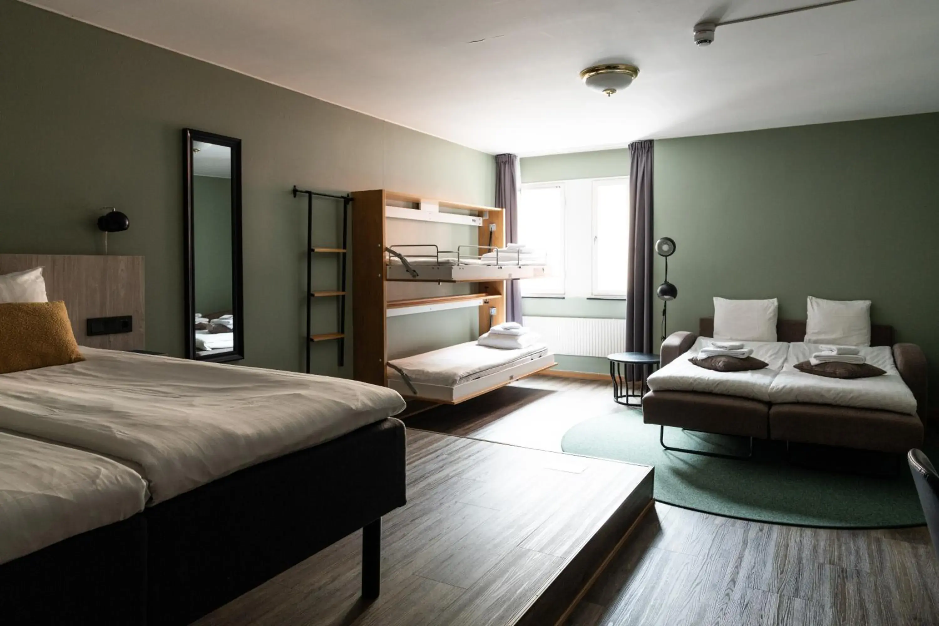 Family Room with Two Single Beds, One Bunk Bed and One Sofa Bed - Non-Smoking in Best Western Kom Hotel Stockholm Family Room with Two Single Beds, One Bunk Bed and One Sofa Bed - Non-Smoking in Best Western Kom Hotel Stockholm