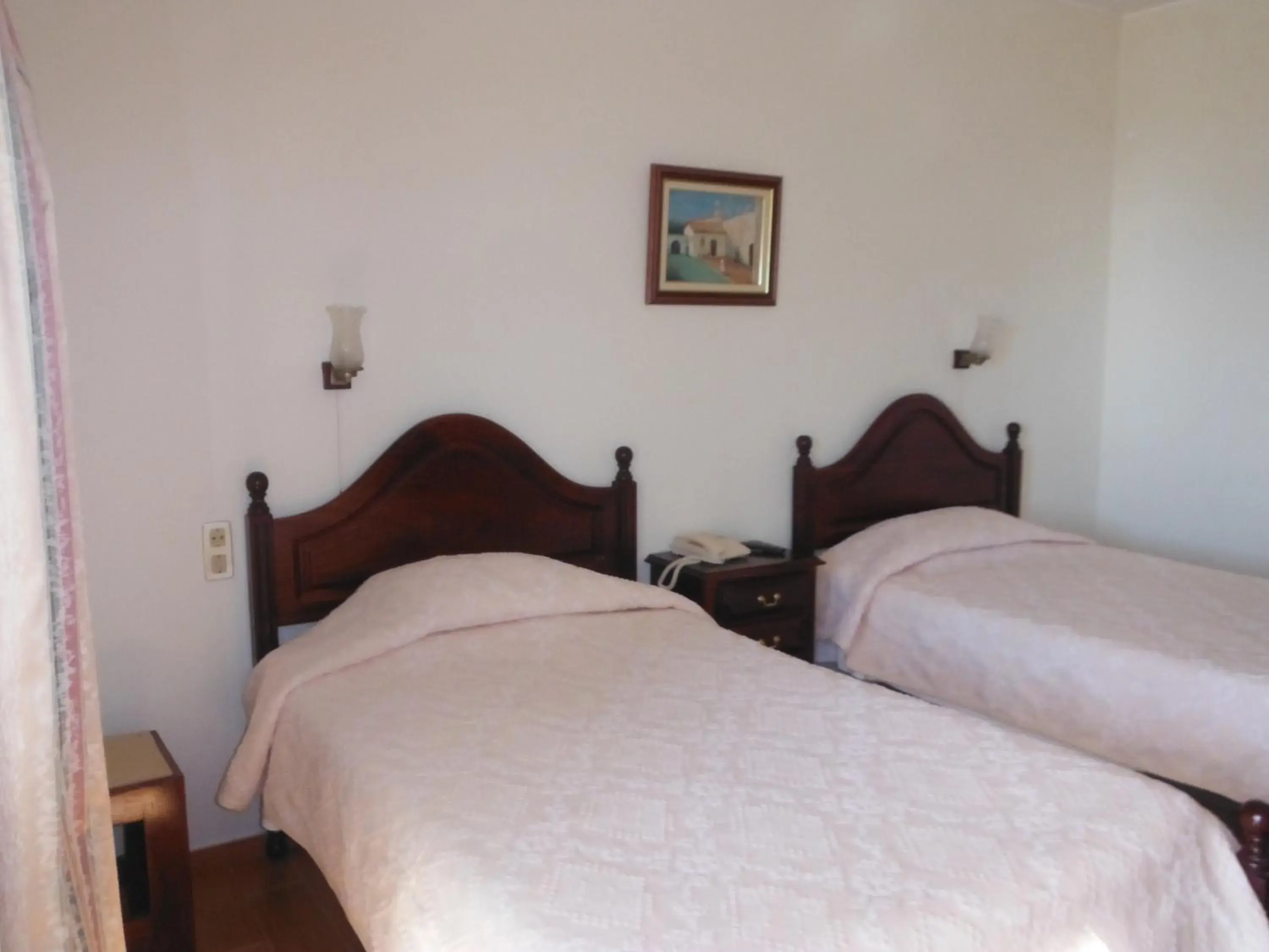 Twin Room with Balcony and Side View in Aeromar Beach Hotel Twin Room with Balcony and Side View in Aeromar Beach Hotel