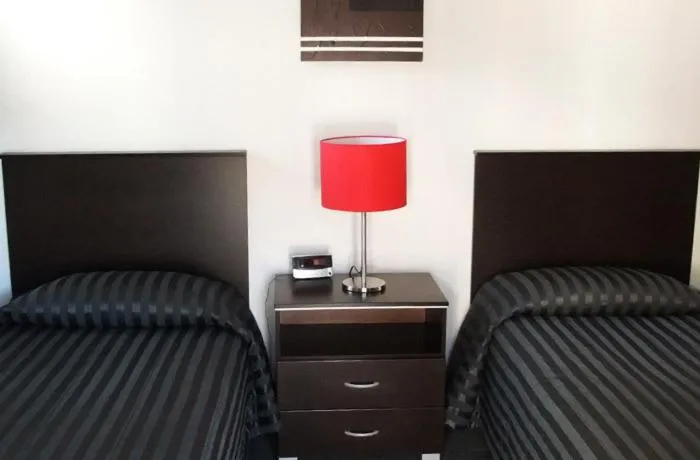 Bed in 83 By The Sea Motor Lodge