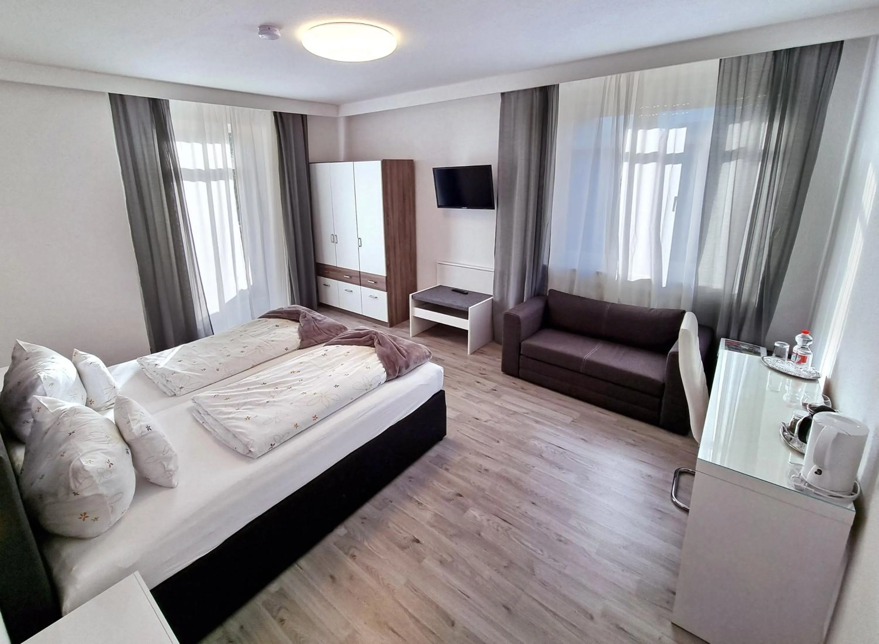 Living room, Bed in Gesundheitshotel Rössle