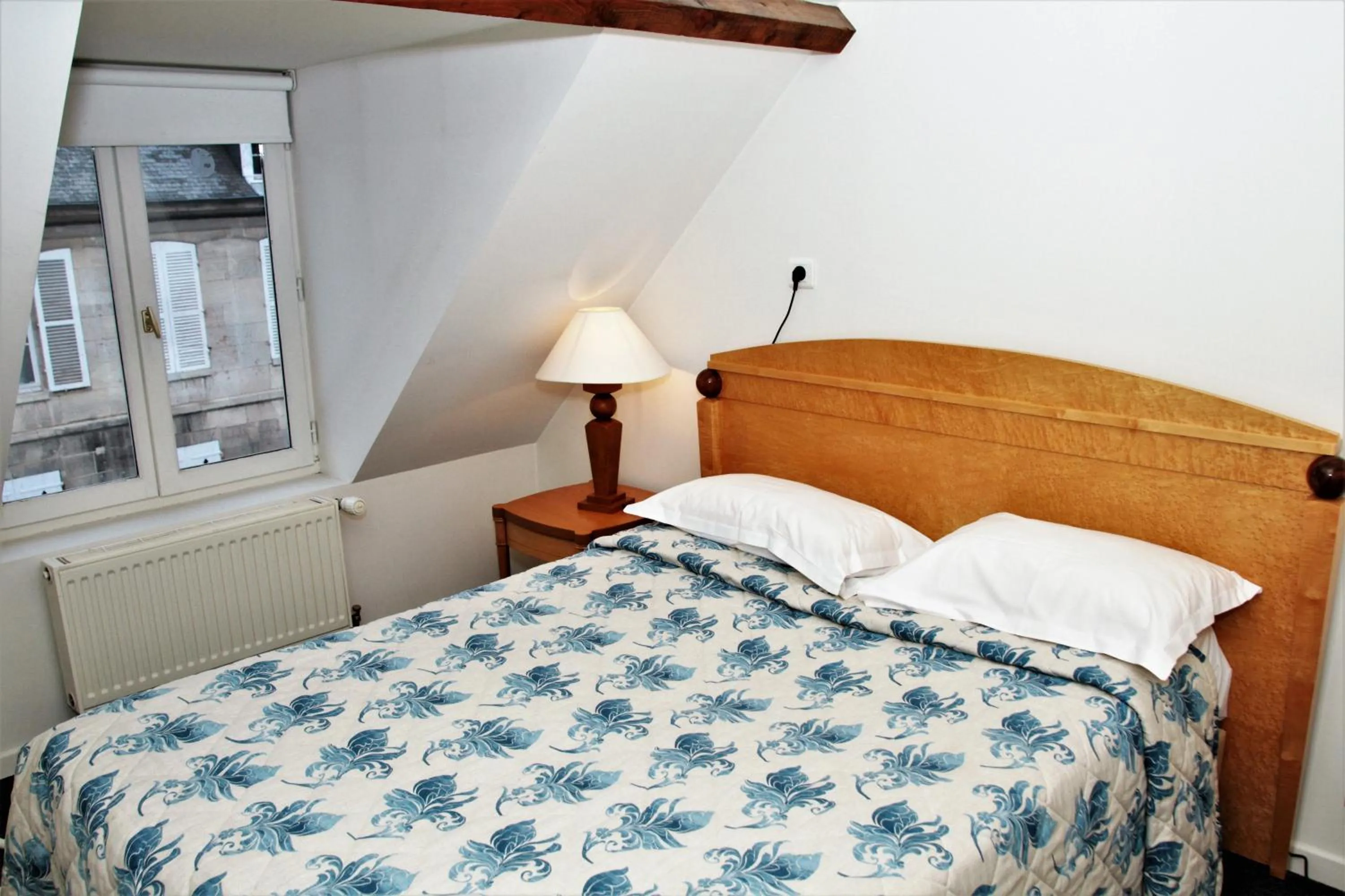 Bed in Hôtel Le Régent
