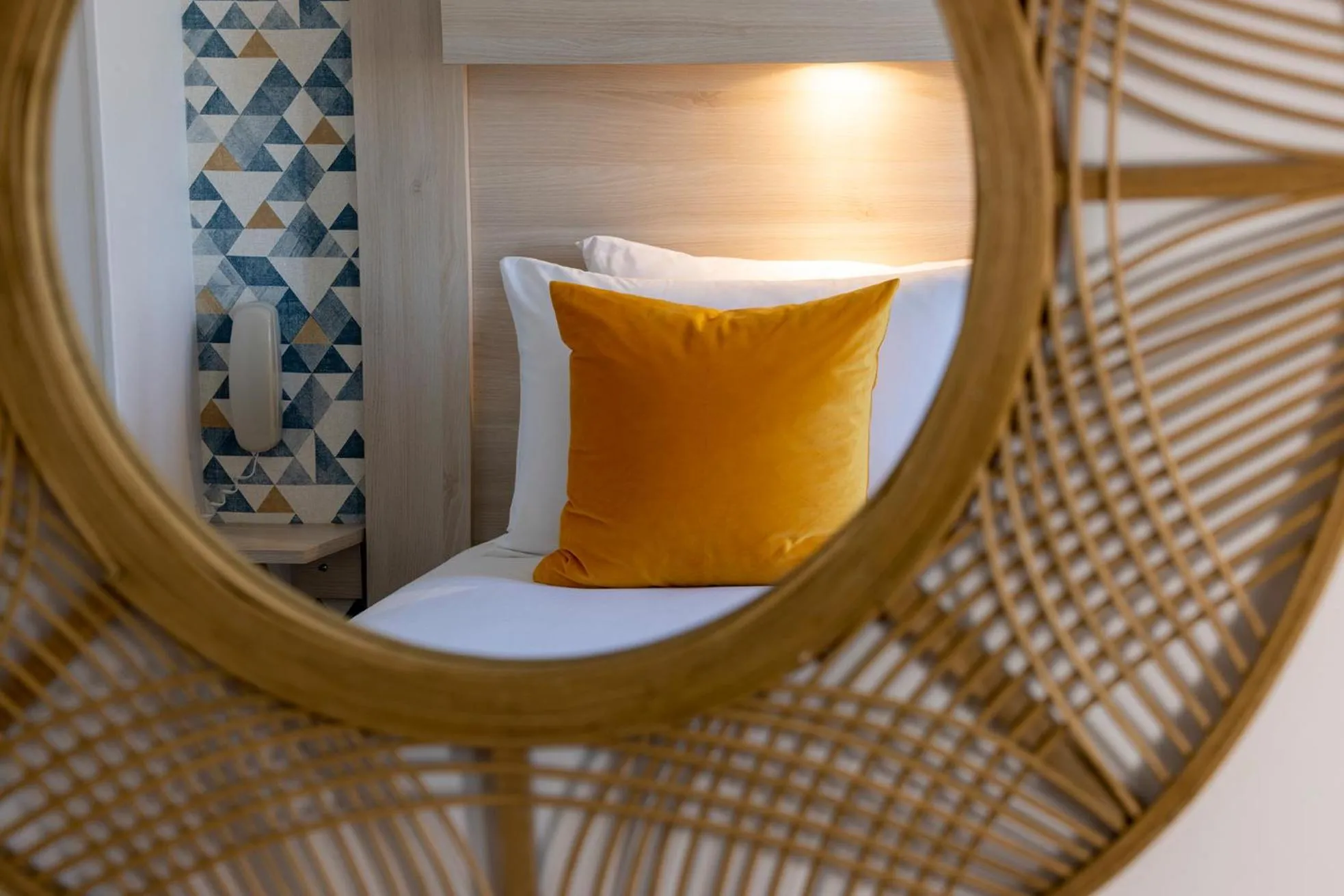 Decorative detail, Bed in Hôtel de Lion sur Mer