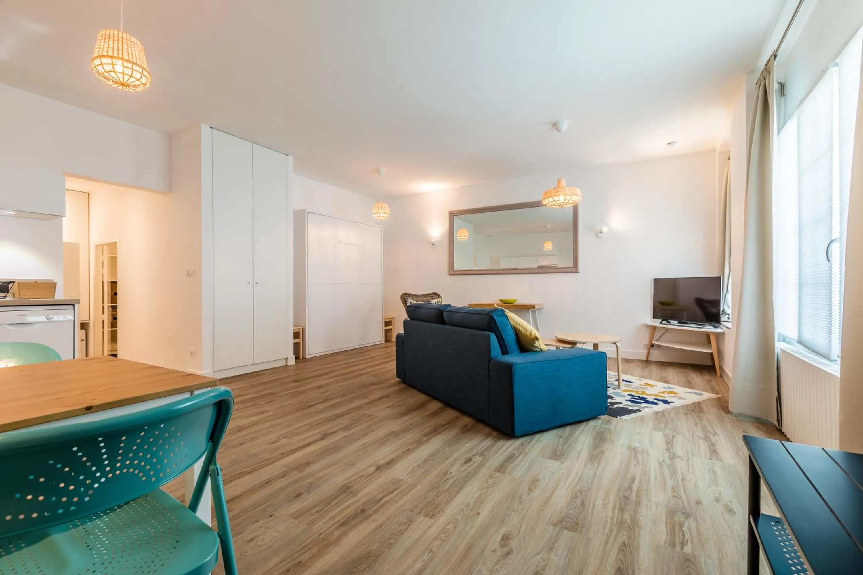 Communal lounge/ TV room in Hôtel Kemaris