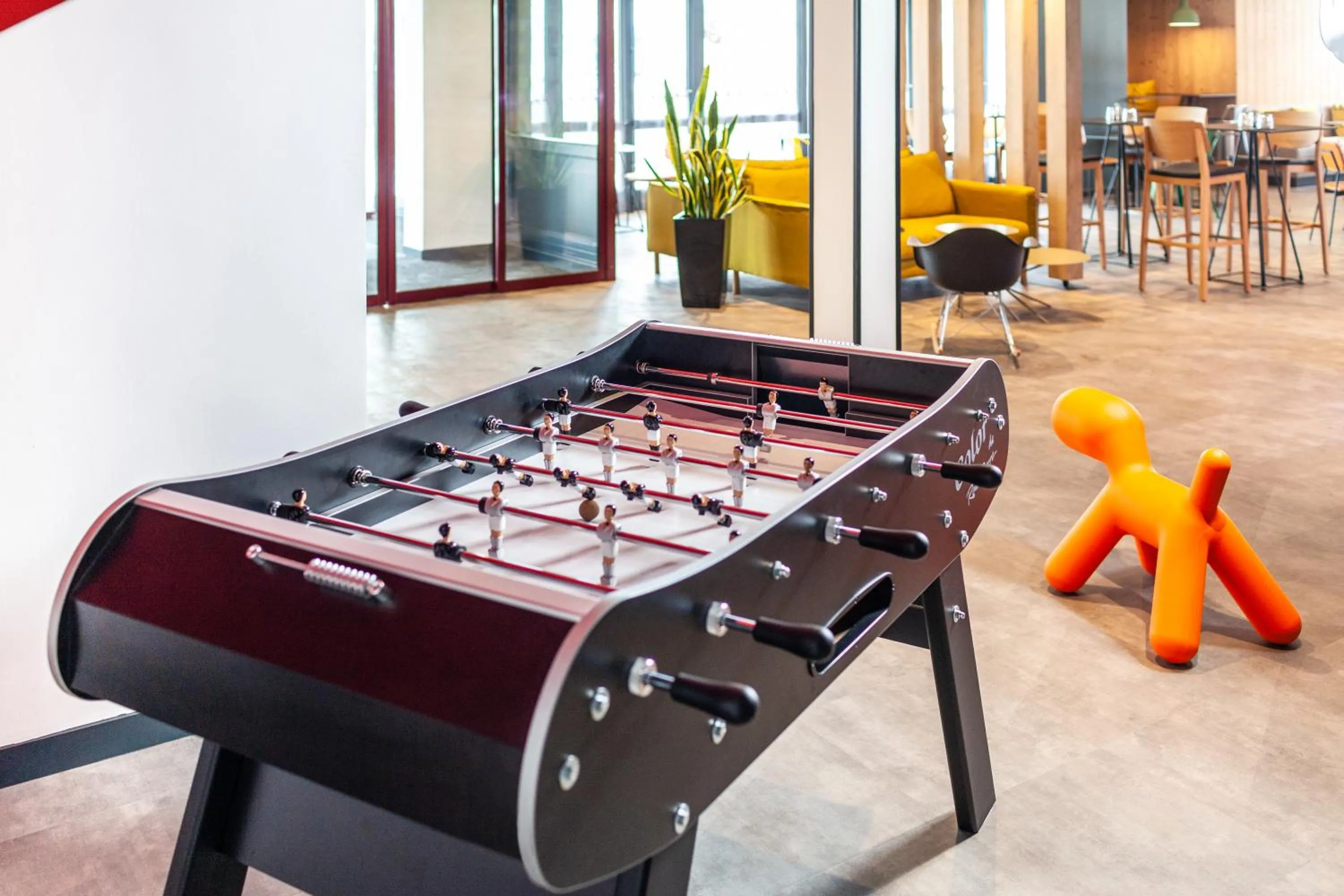 Communal lounge/ TV room in Ibis Pontarlier