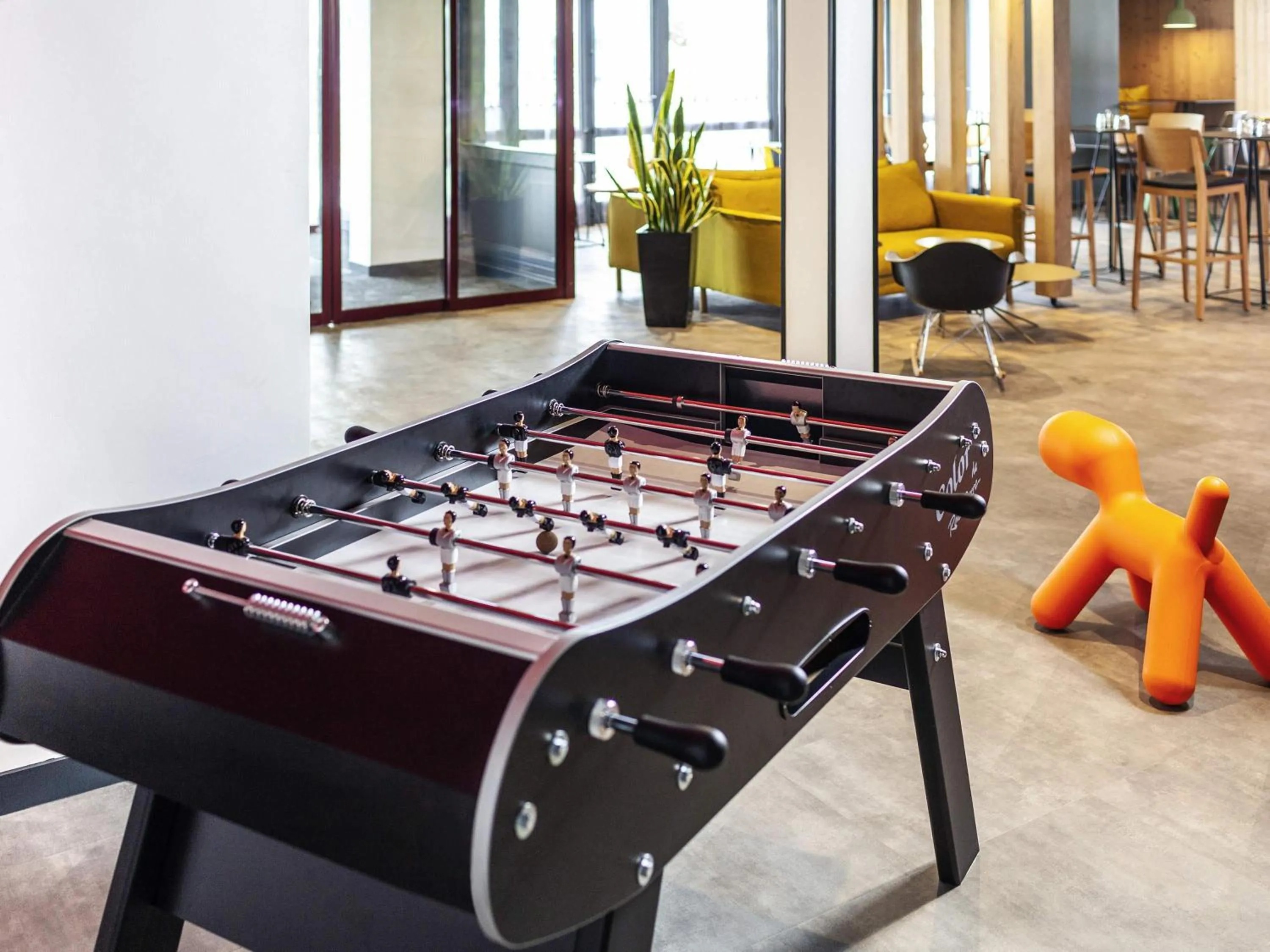 Lounge or bar in Ibis Pontarlier