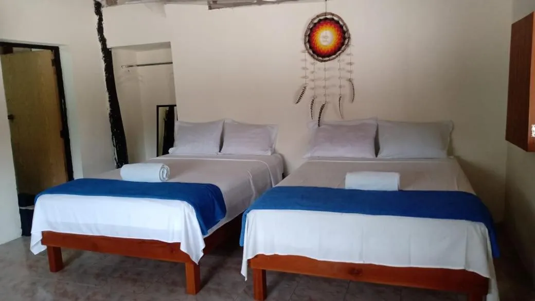 Photo of the whole room, Bed in Cabañas El Cuyo