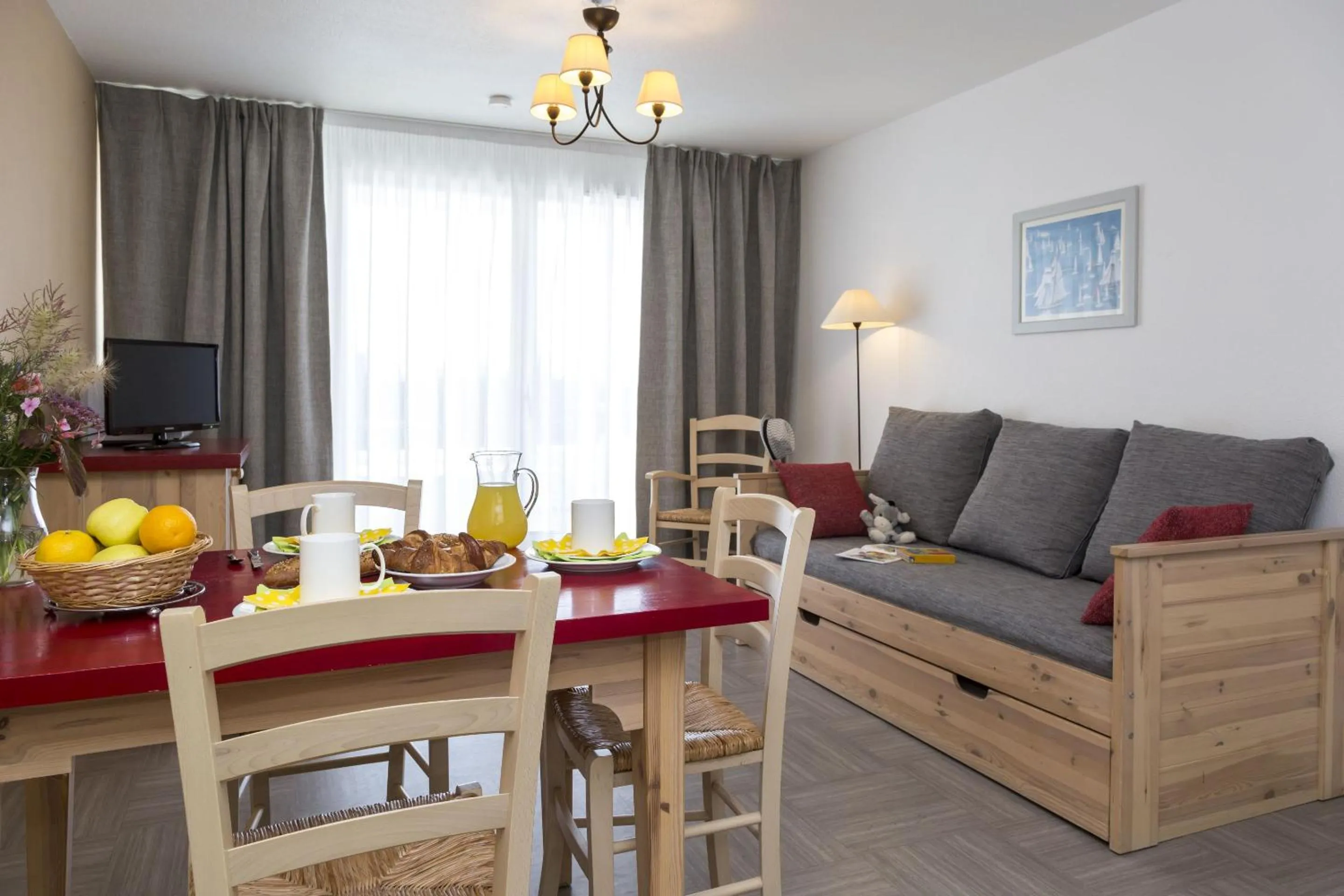 Seating area in Résidence Odalys Domaine des Roches Jaunes