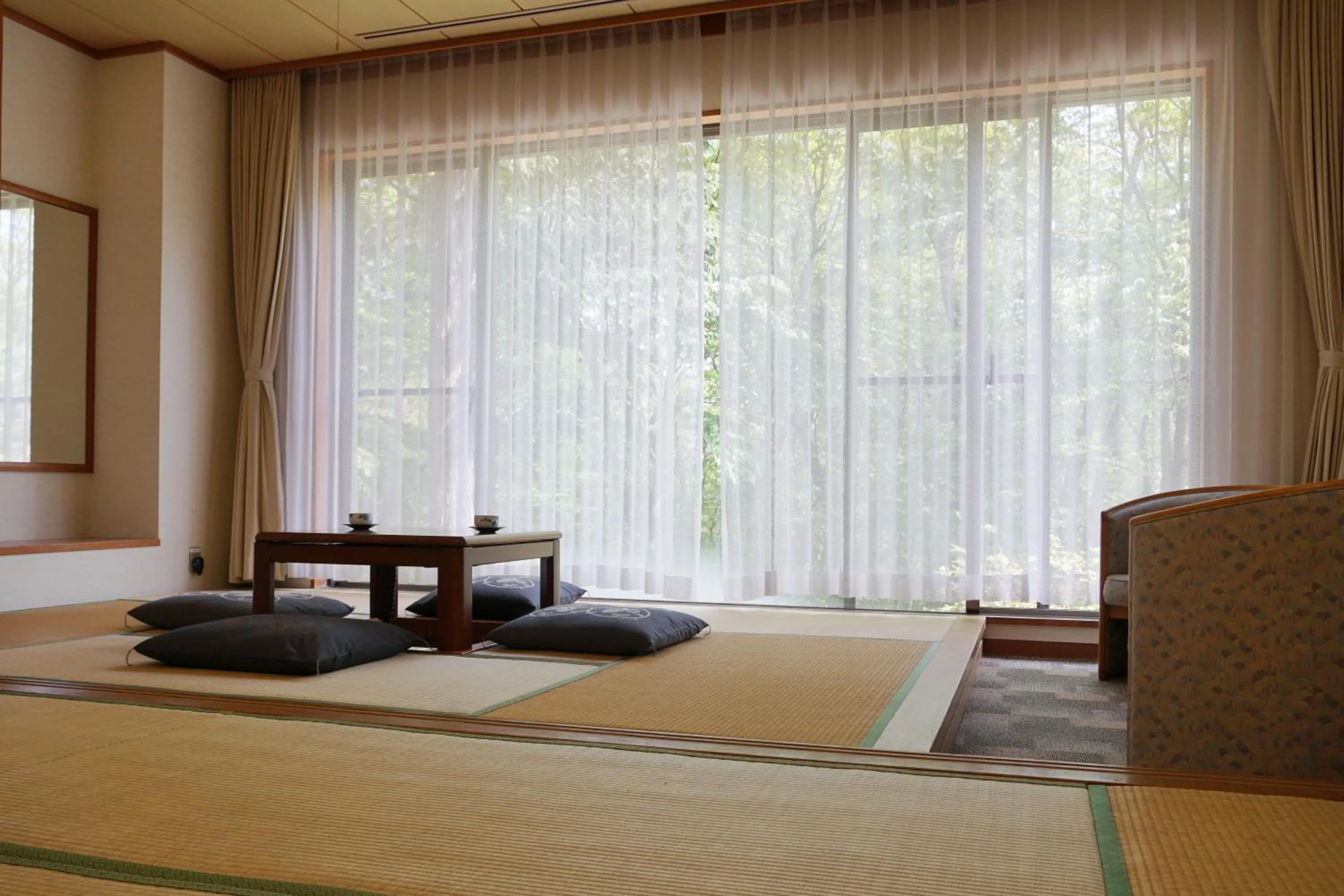 Living room, Bed in Blancvert Nasu Onsen Hotel