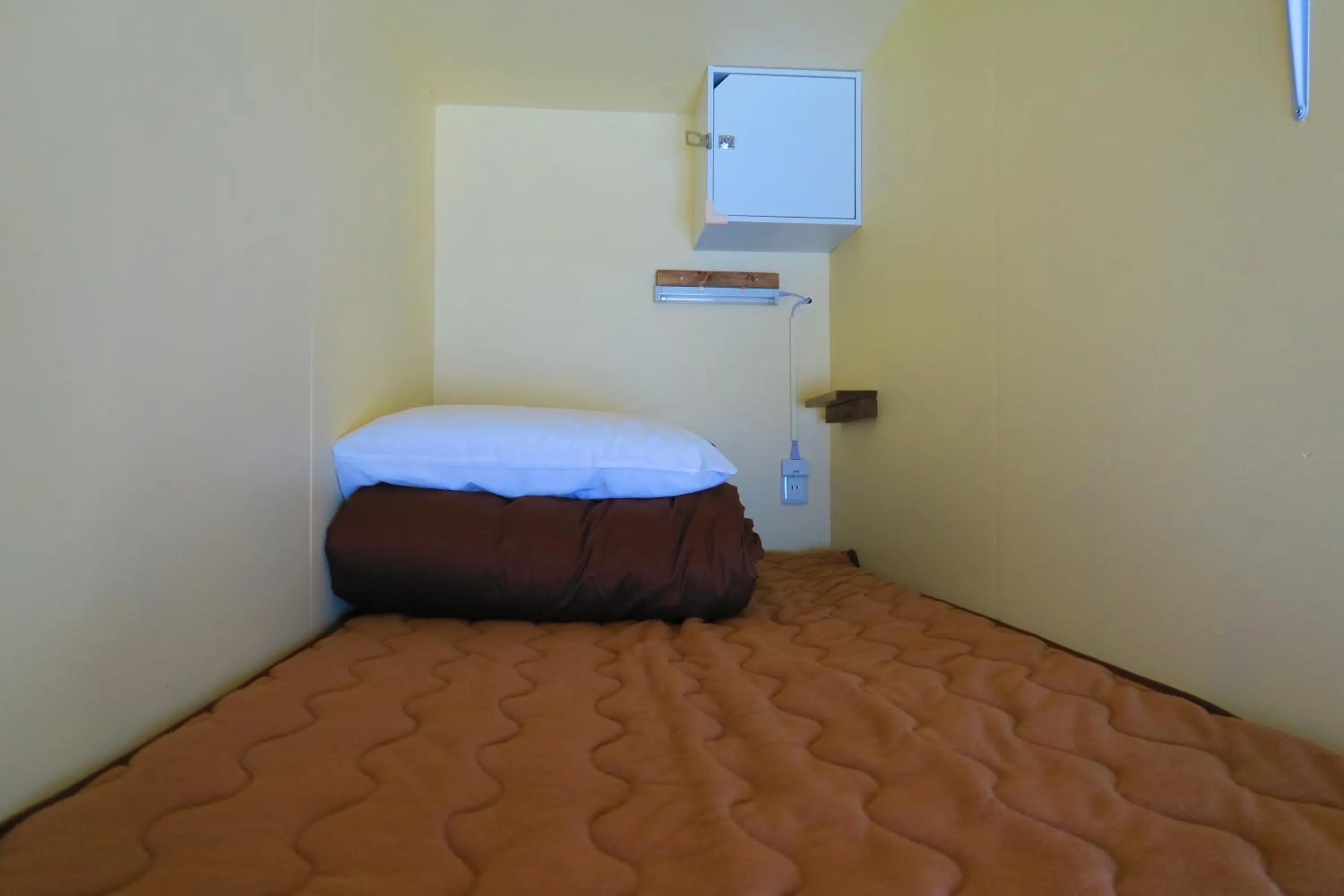 Bed in Takamatsu Guesthouse BJ Station