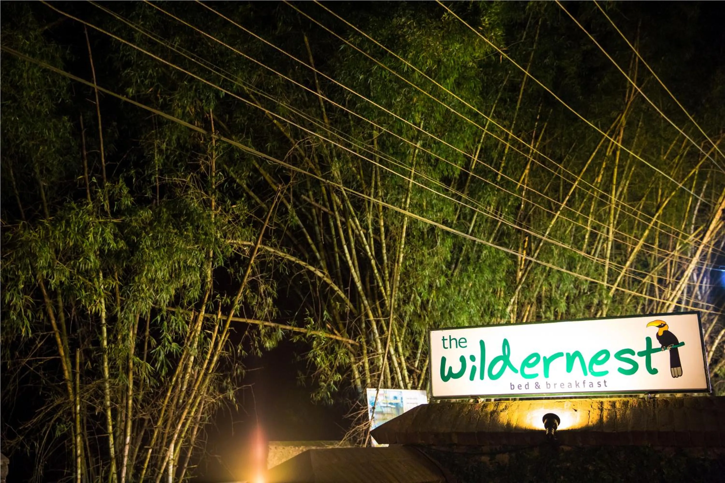 Property logo or sign in Wildernest