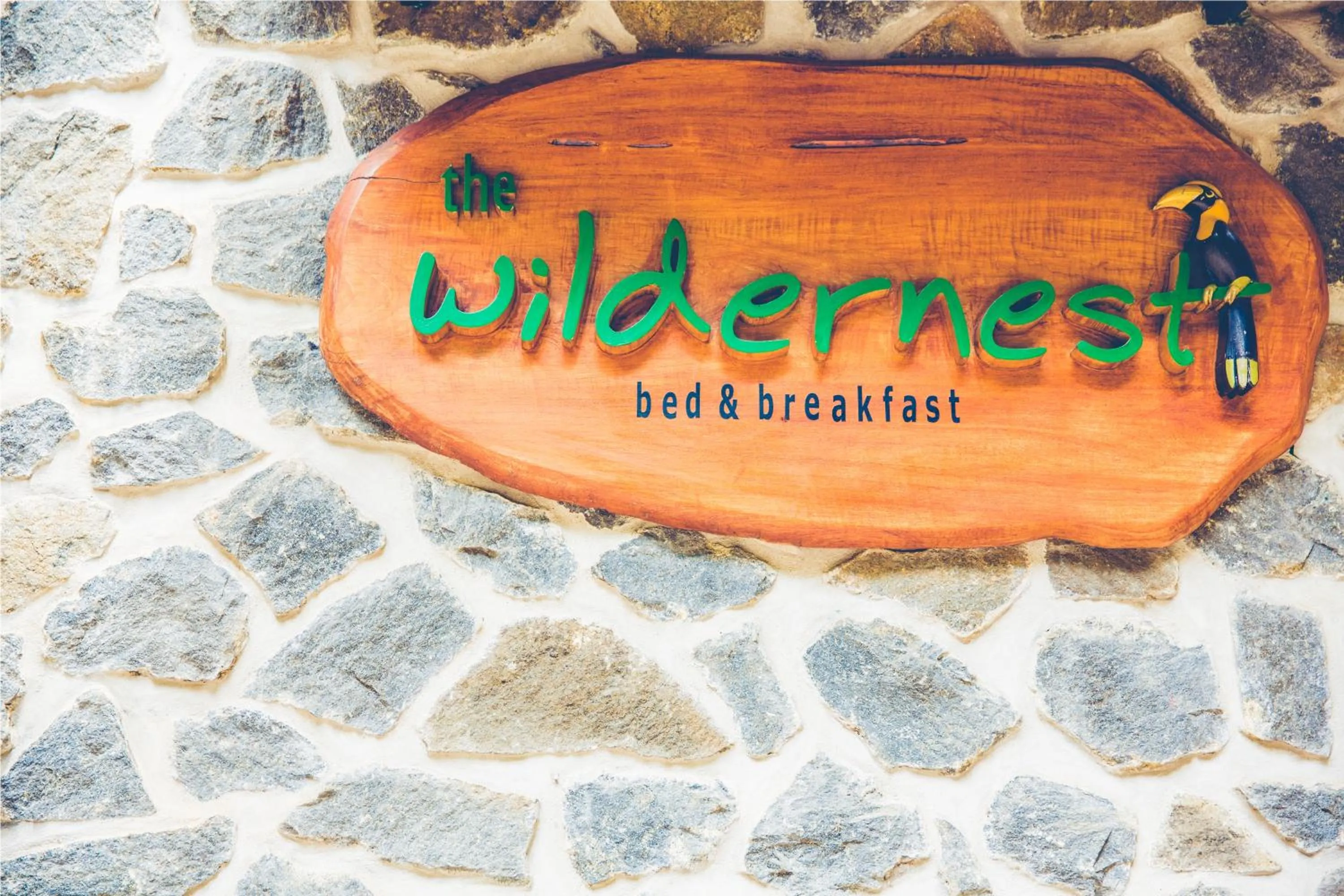 Property logo or sign in Wildernest