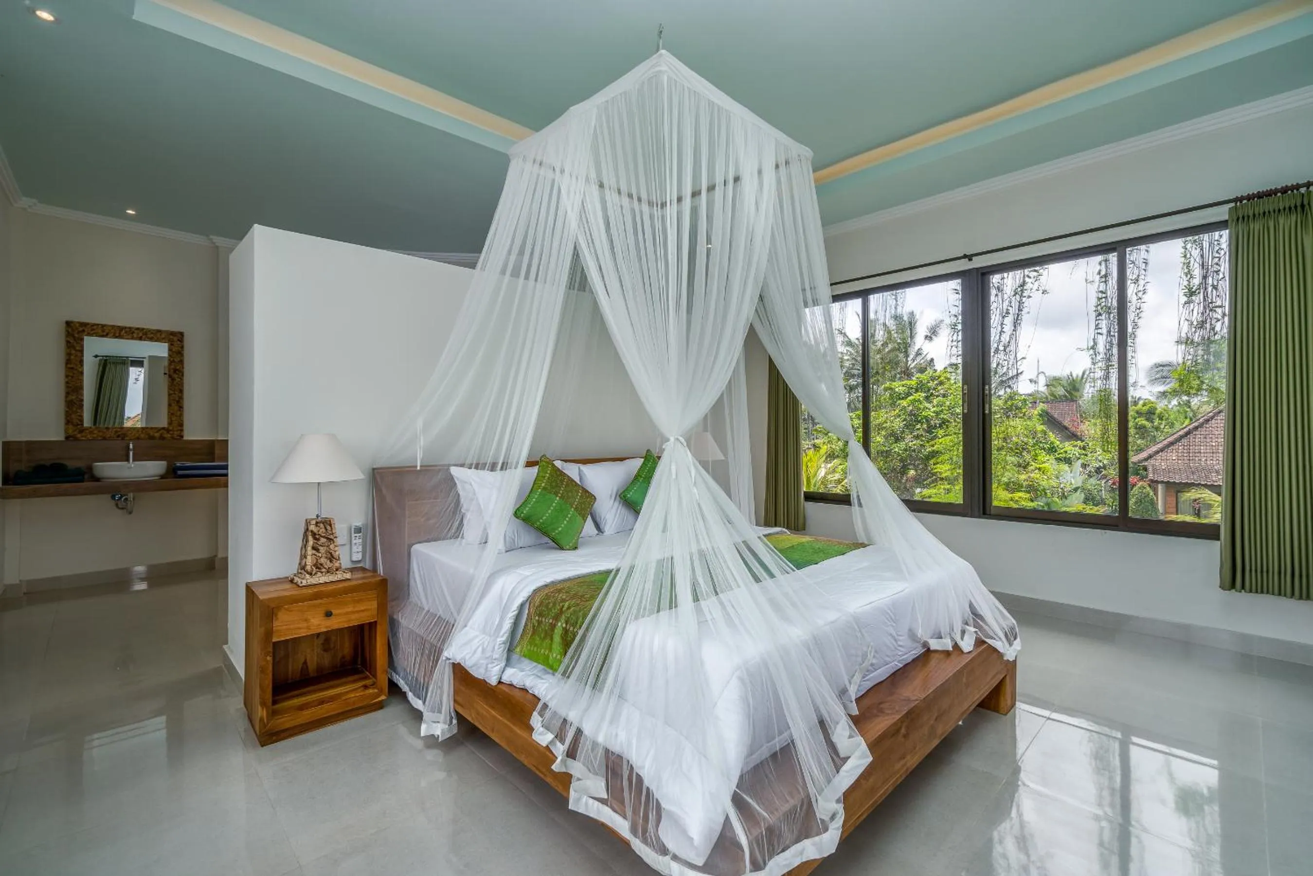 Bed in Cahaya Ubud Villa