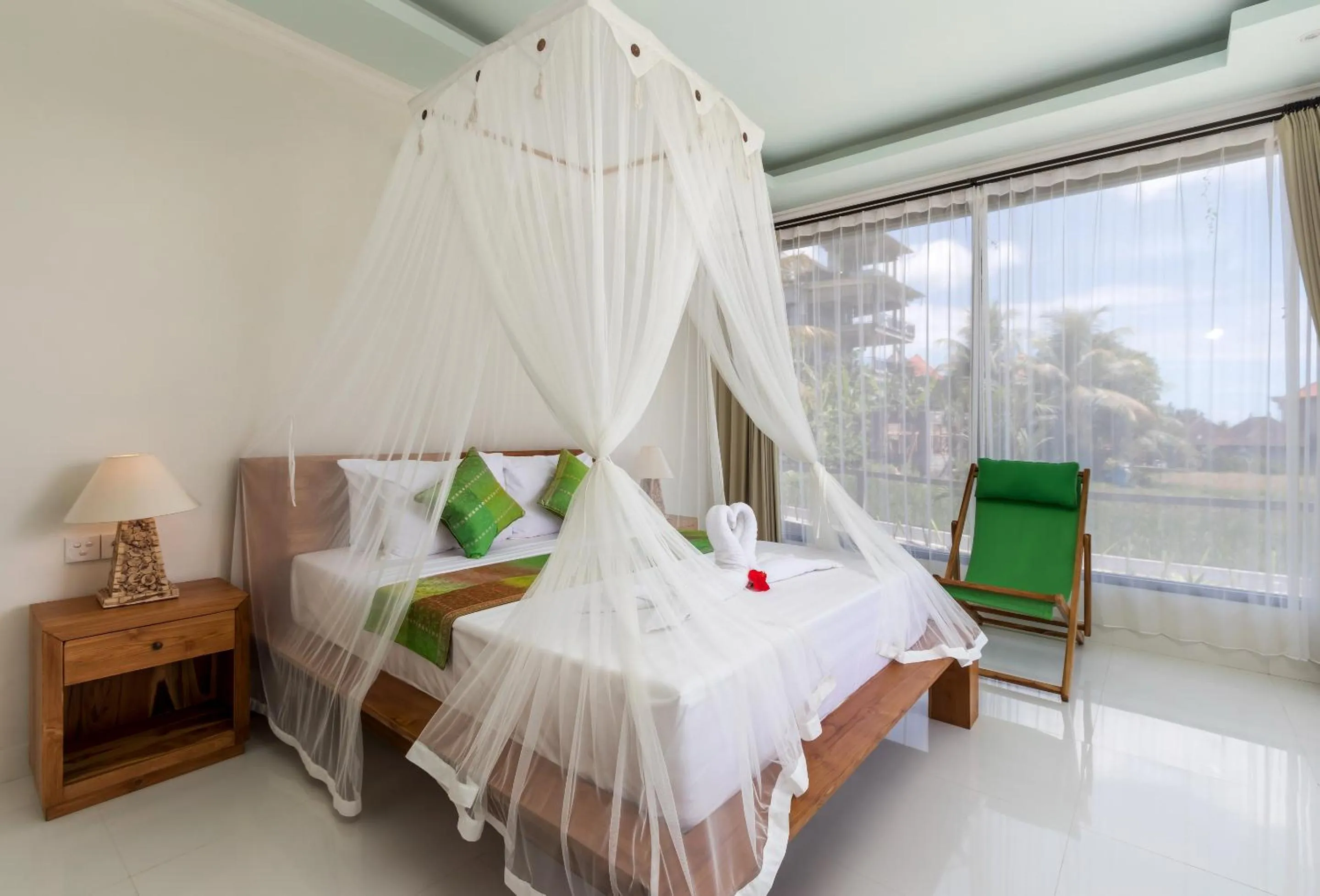 Bed in Cahaya Ubud Villa