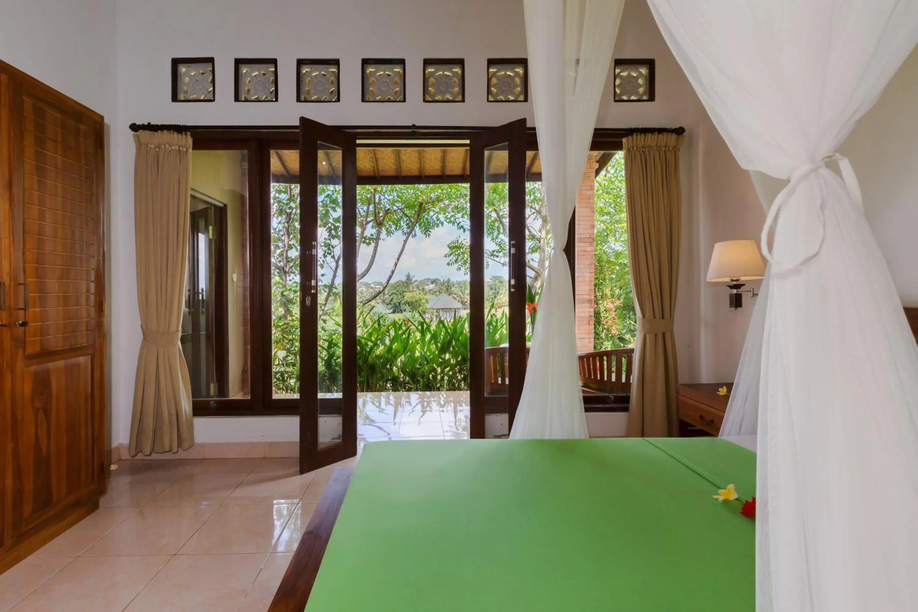 Bed in Cahaya Ubud Villa