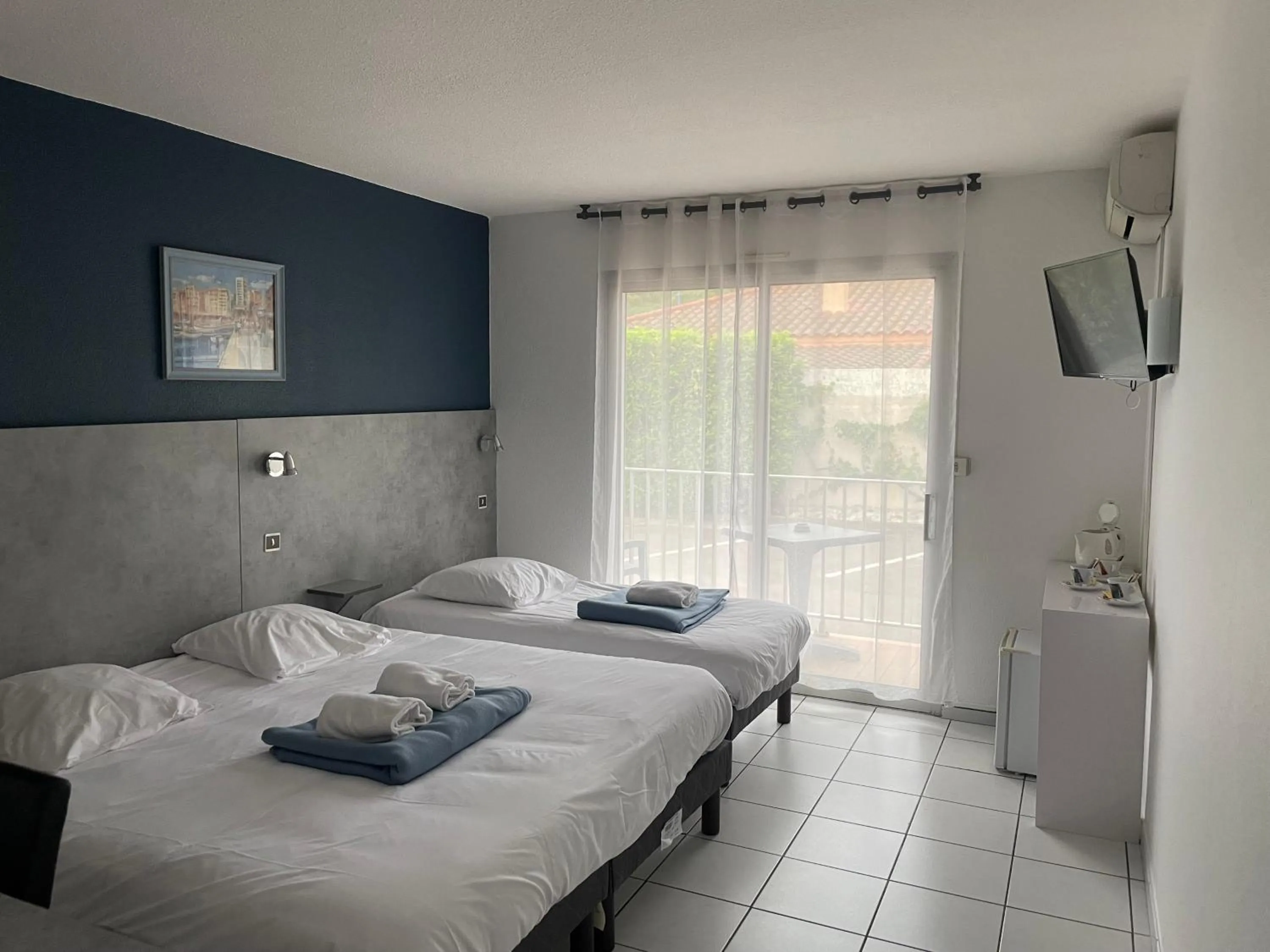 Bed in Acapella Hotel