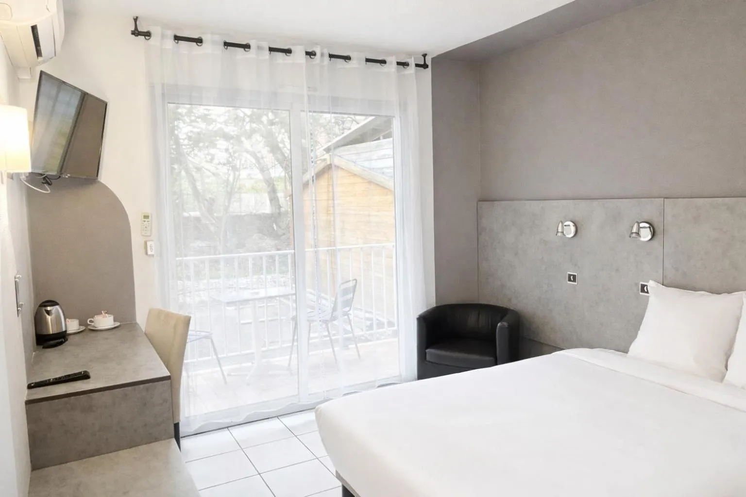 Bed in Acapella Hotel