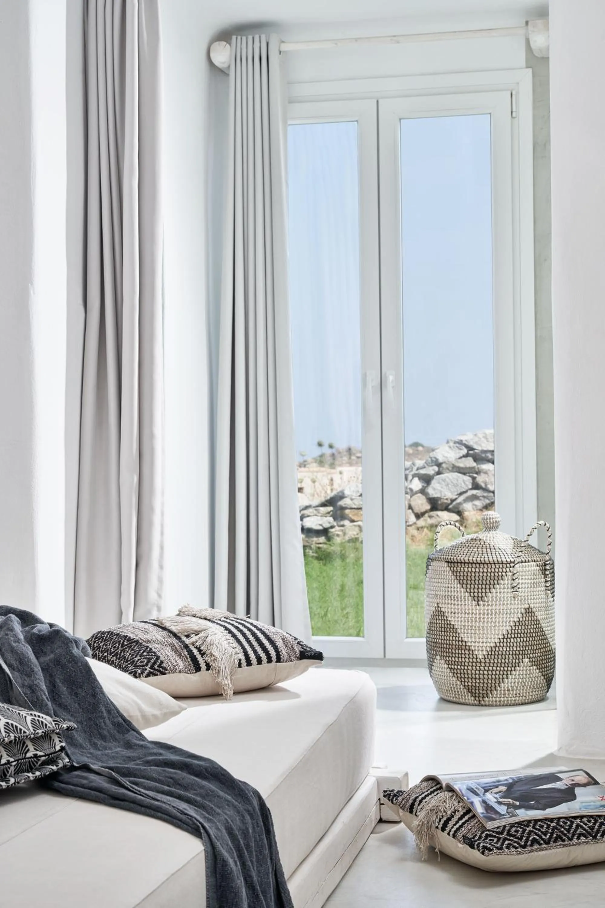 Living room, Bed in Naxian Utopia | Luxury Villas & Suites