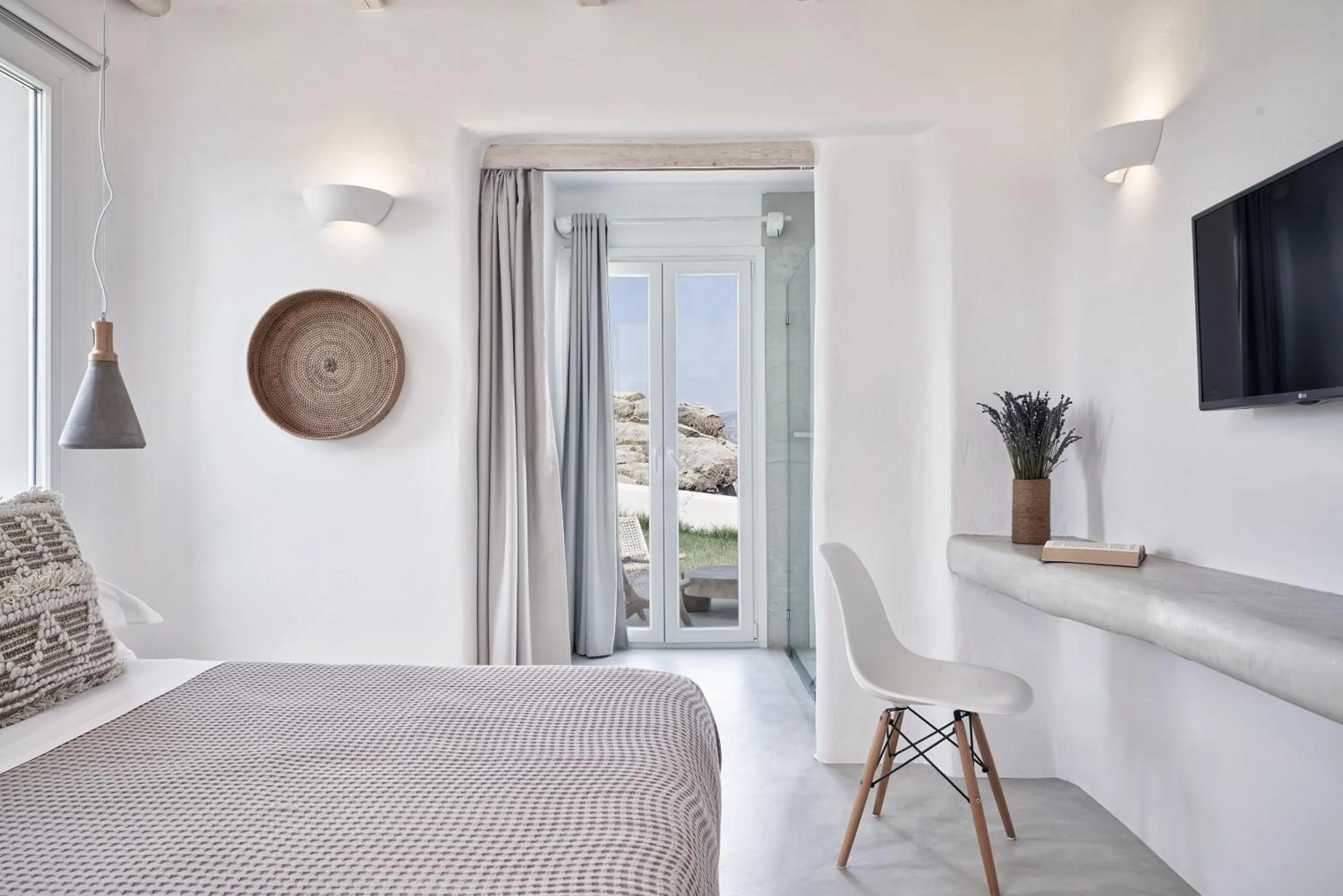 TV and multimedia, Bed in Naxian Utopia | Luxury Villas & Suites