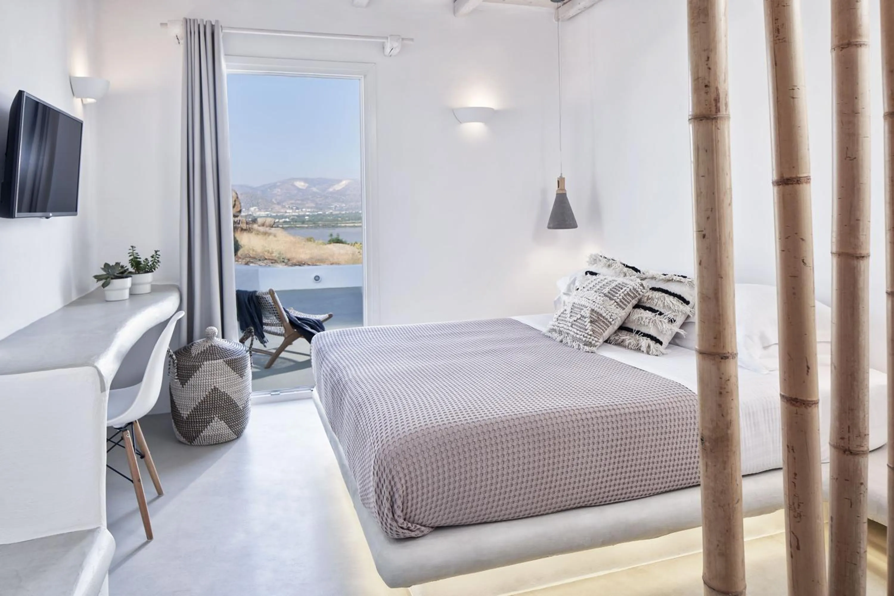 Bed in Naxian Utopia | Luxury Villas & Suites
