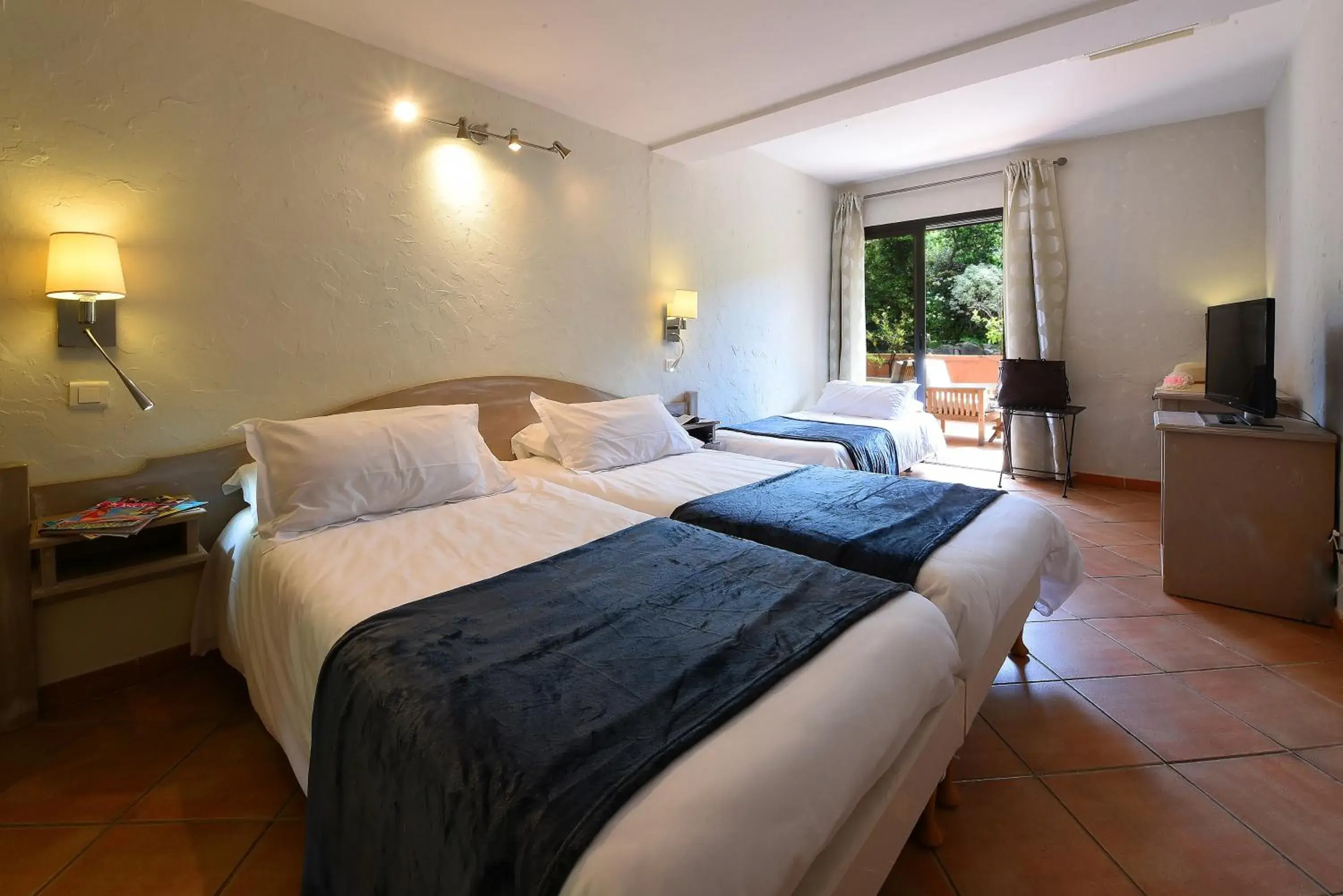 Ground Floor Double Room Park Side in Hôtel Castel d'Orcino Ground Floor Double Room Park Side in Hôtel Castel d'Orcino