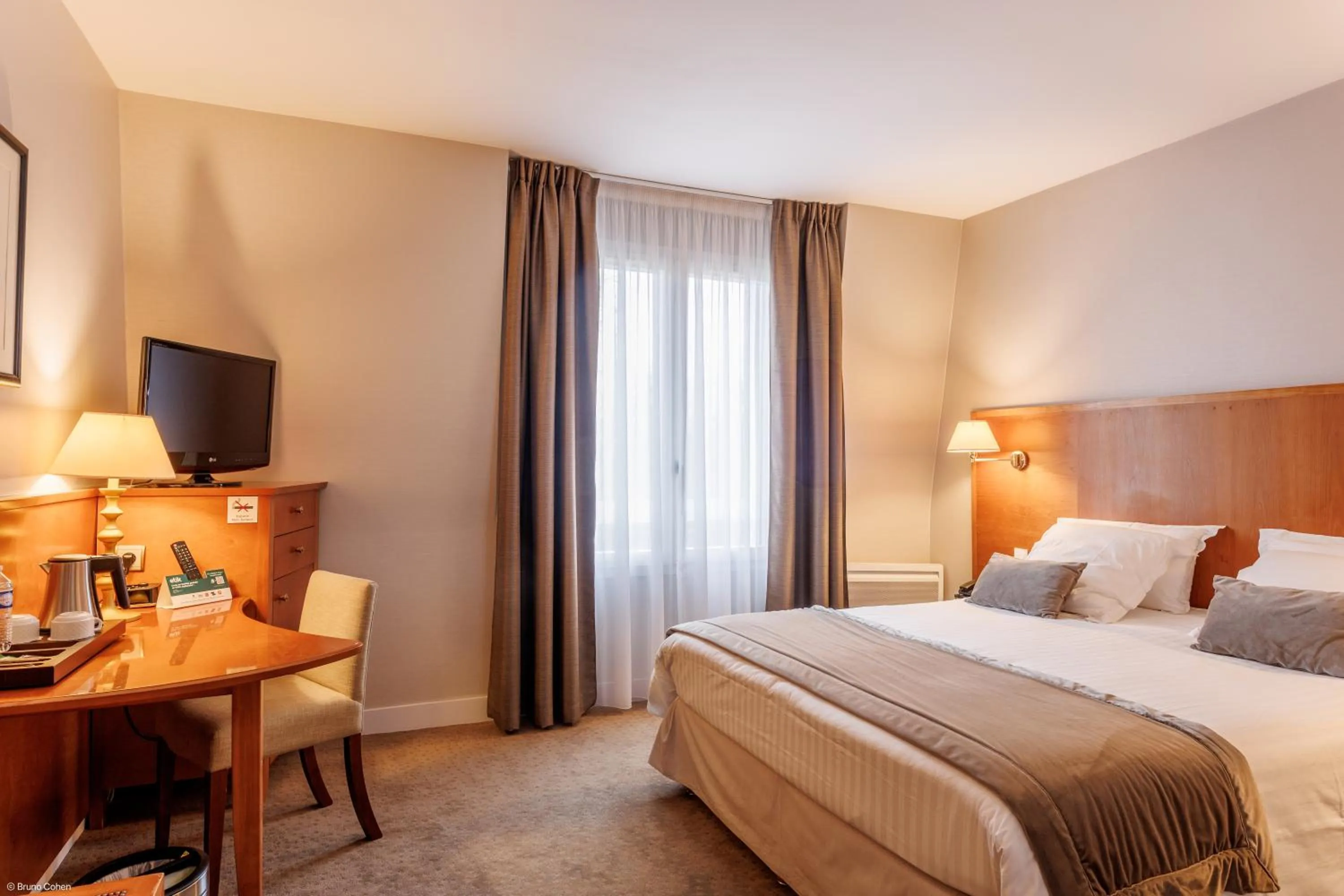 Bed in Hôtel & Restaurant Le Relais d'Aumale