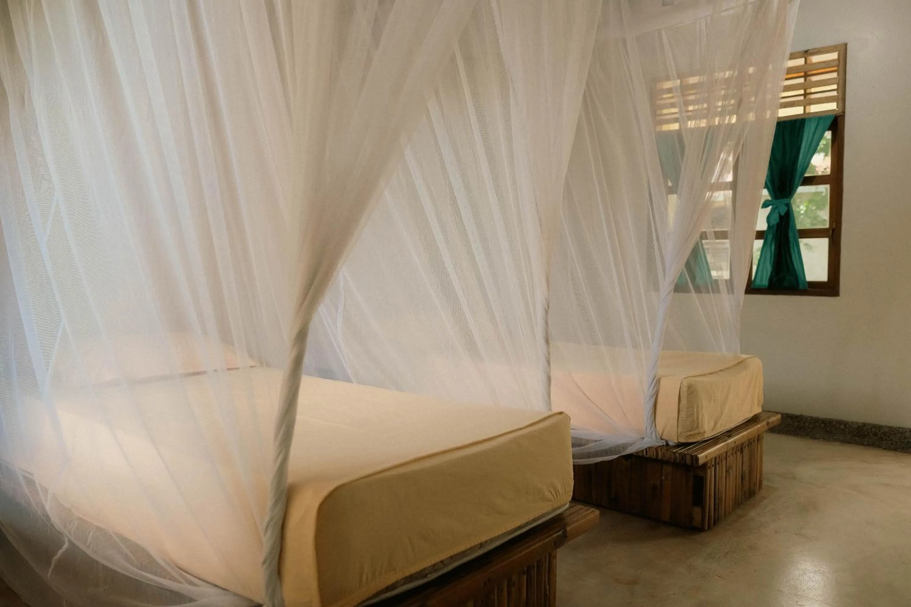 Bed in Ecolodge Bukit Lawang