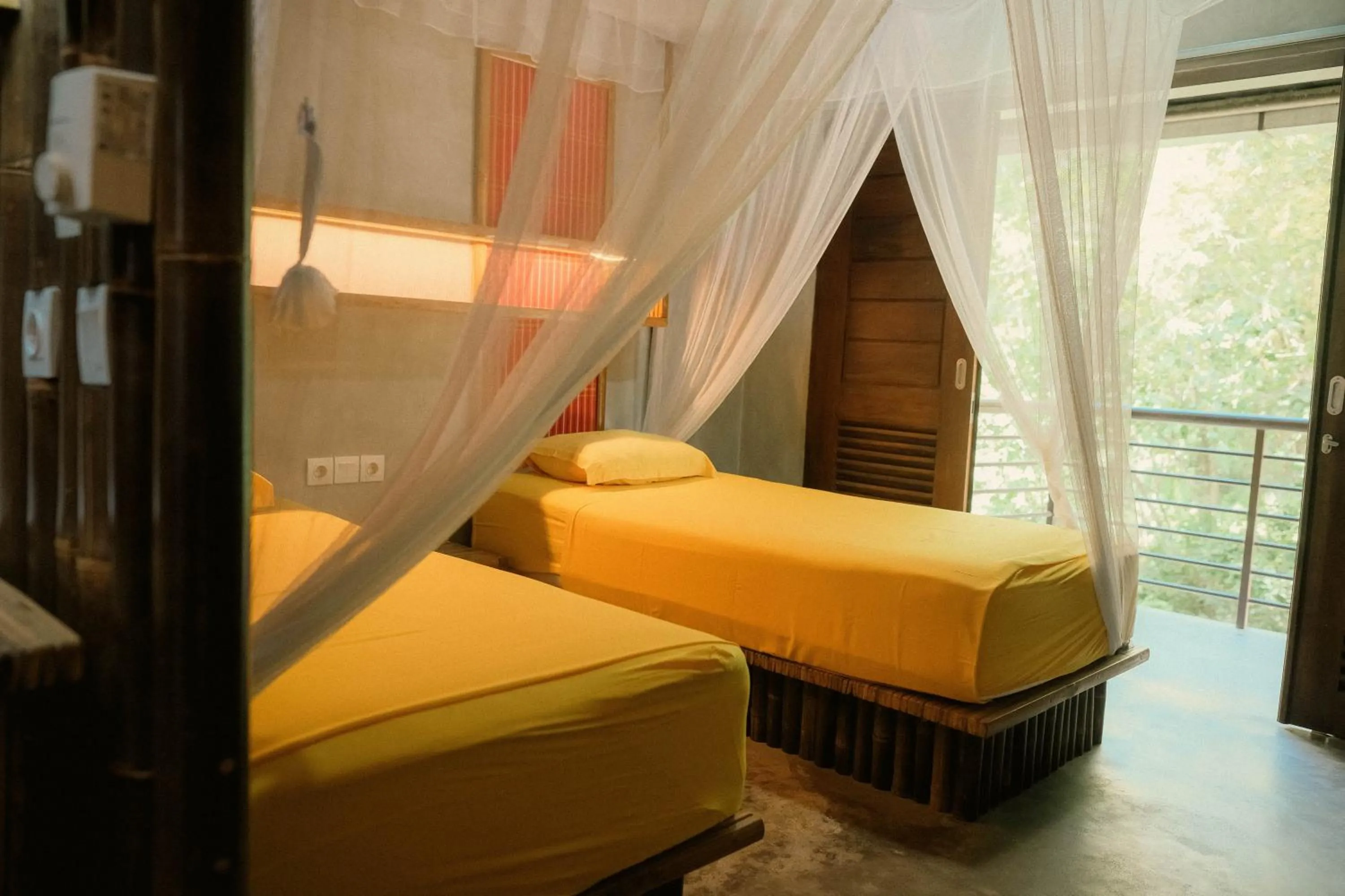 Bed in Ecolodge Bukit Lawang