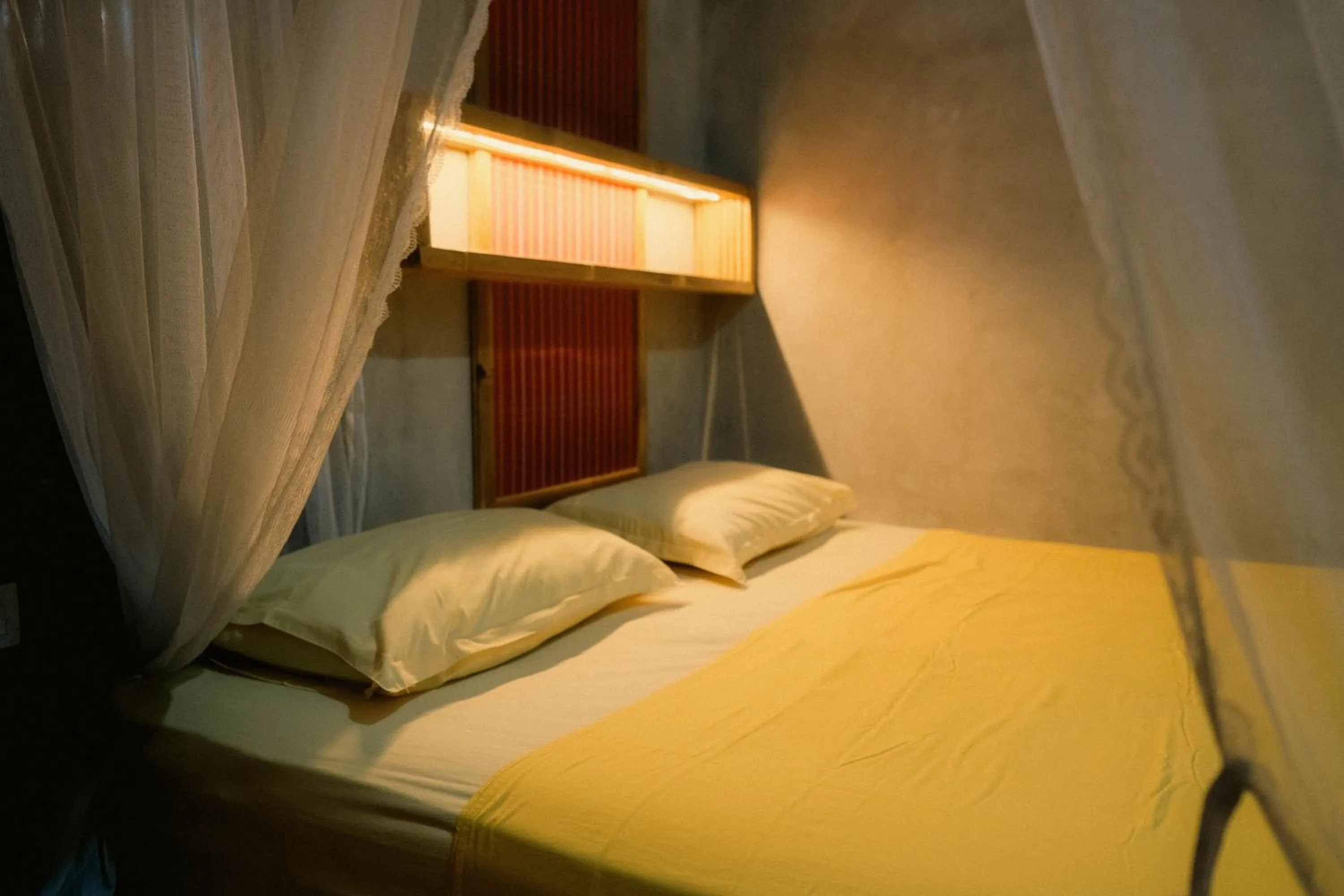 Bed in Ecolodge Bukit Lawang