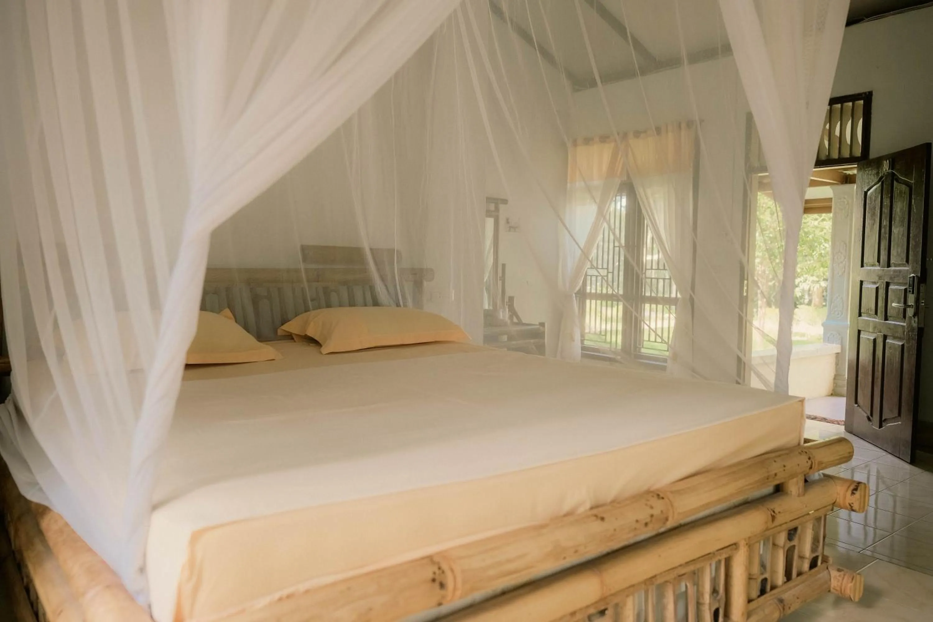Bed in Ecolodge Bukit Lawang