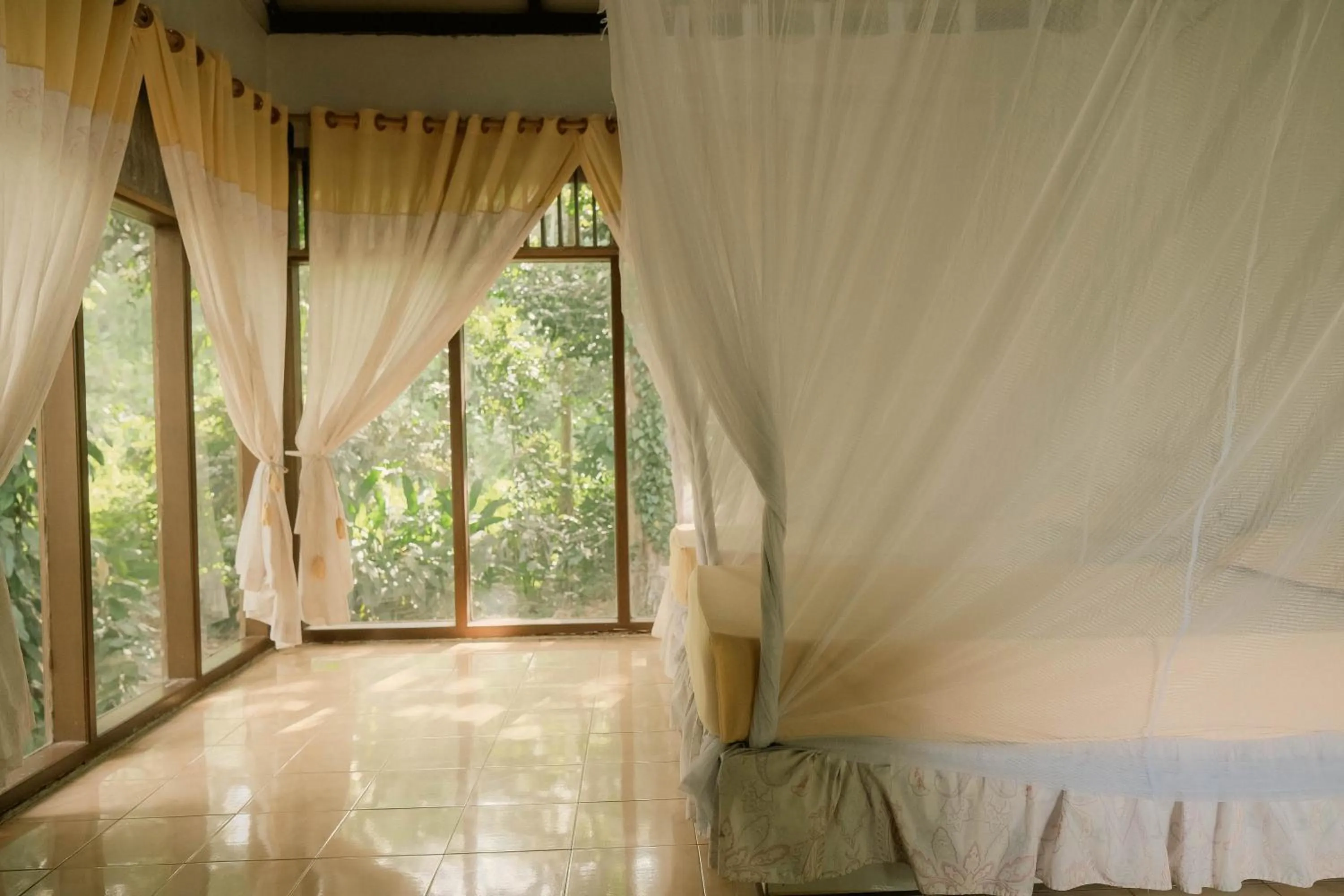 Bed in Ecolodge Bukit Lawang