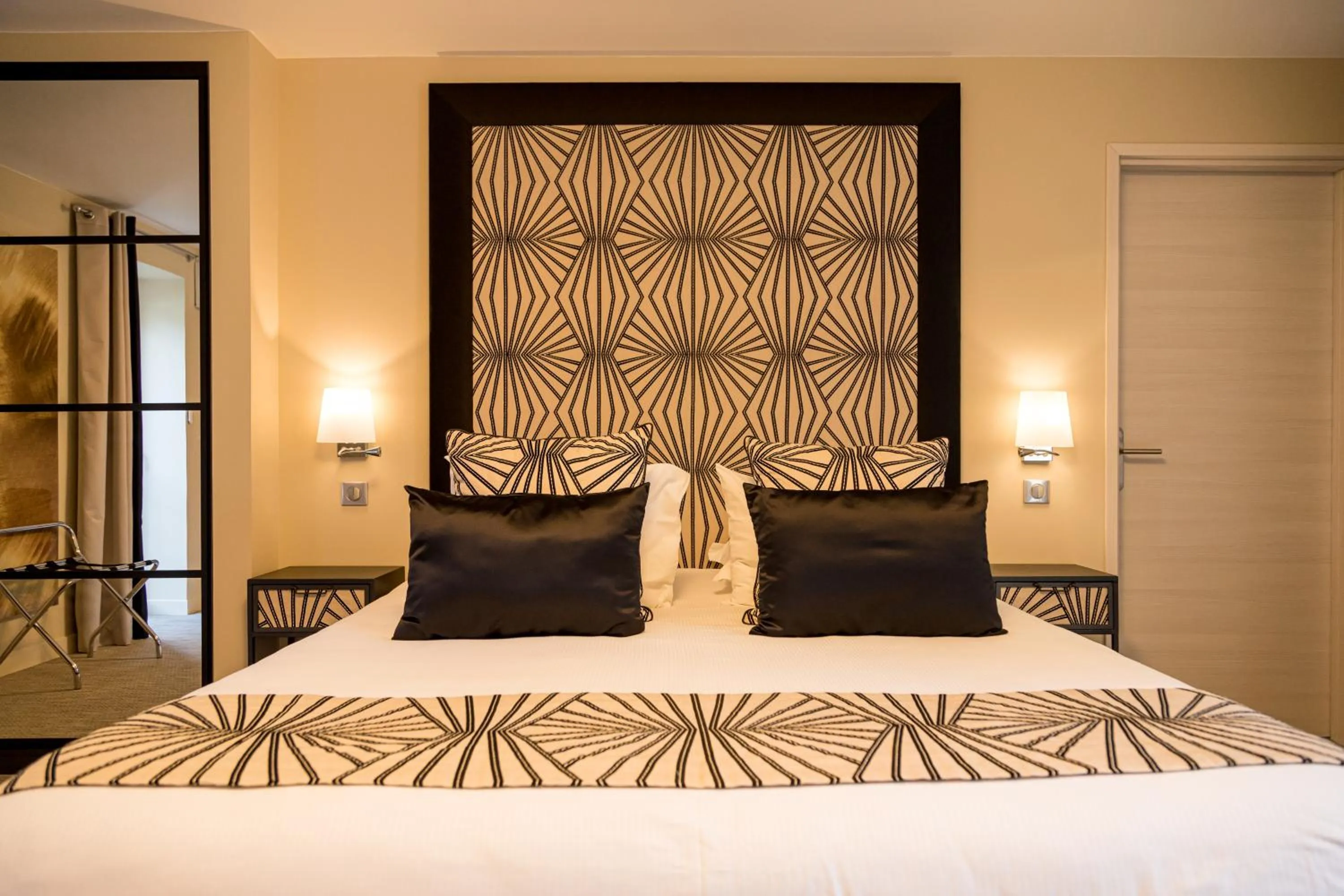 Bed in Maison Doucet - Relais & Châteaux