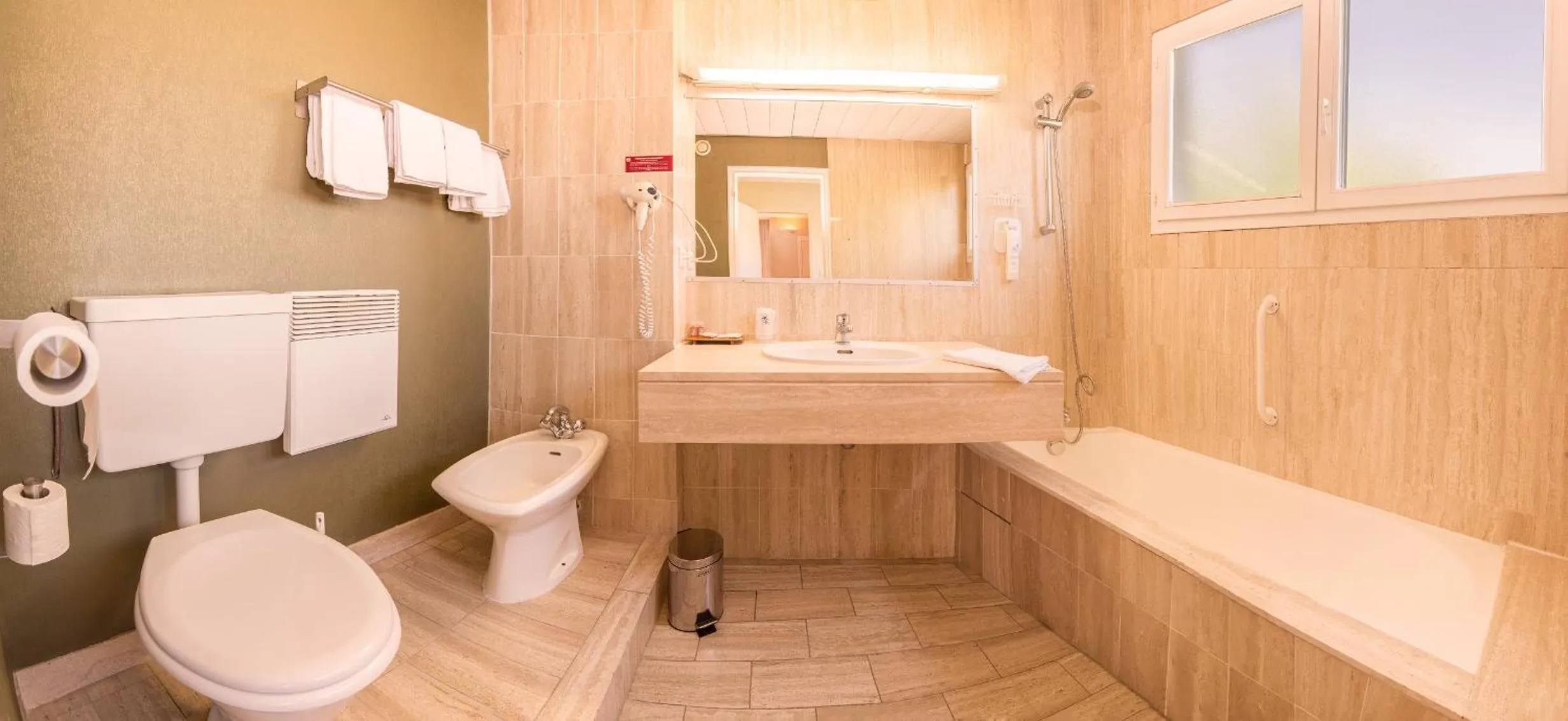 Bathroom in Logis Hôtel Cartier