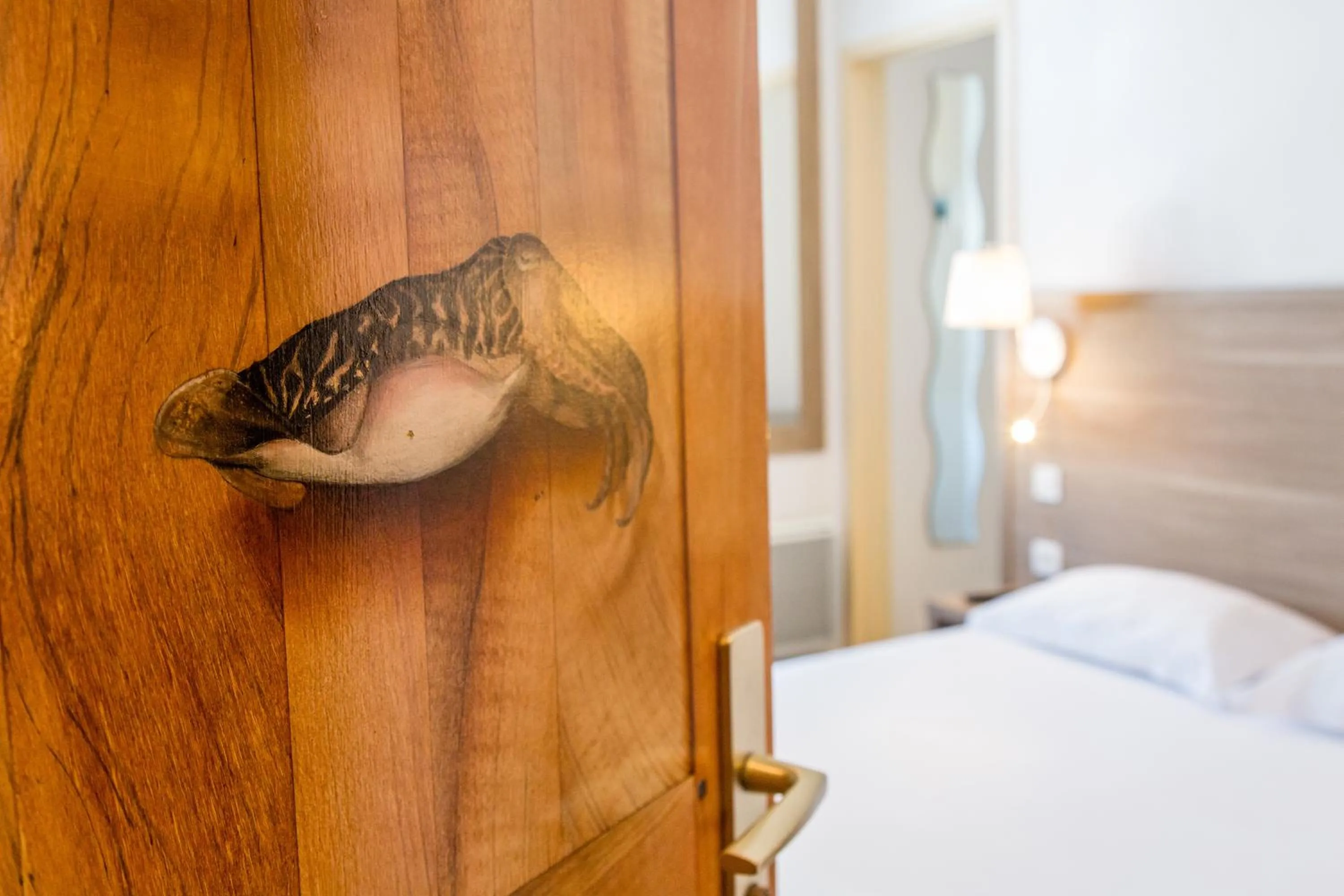 Bed in Logis Le Relais Marine