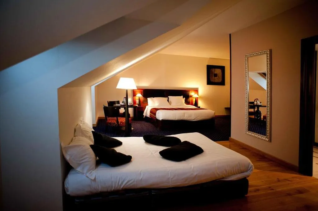 Bed in Le Mauritia Hotel et Spa