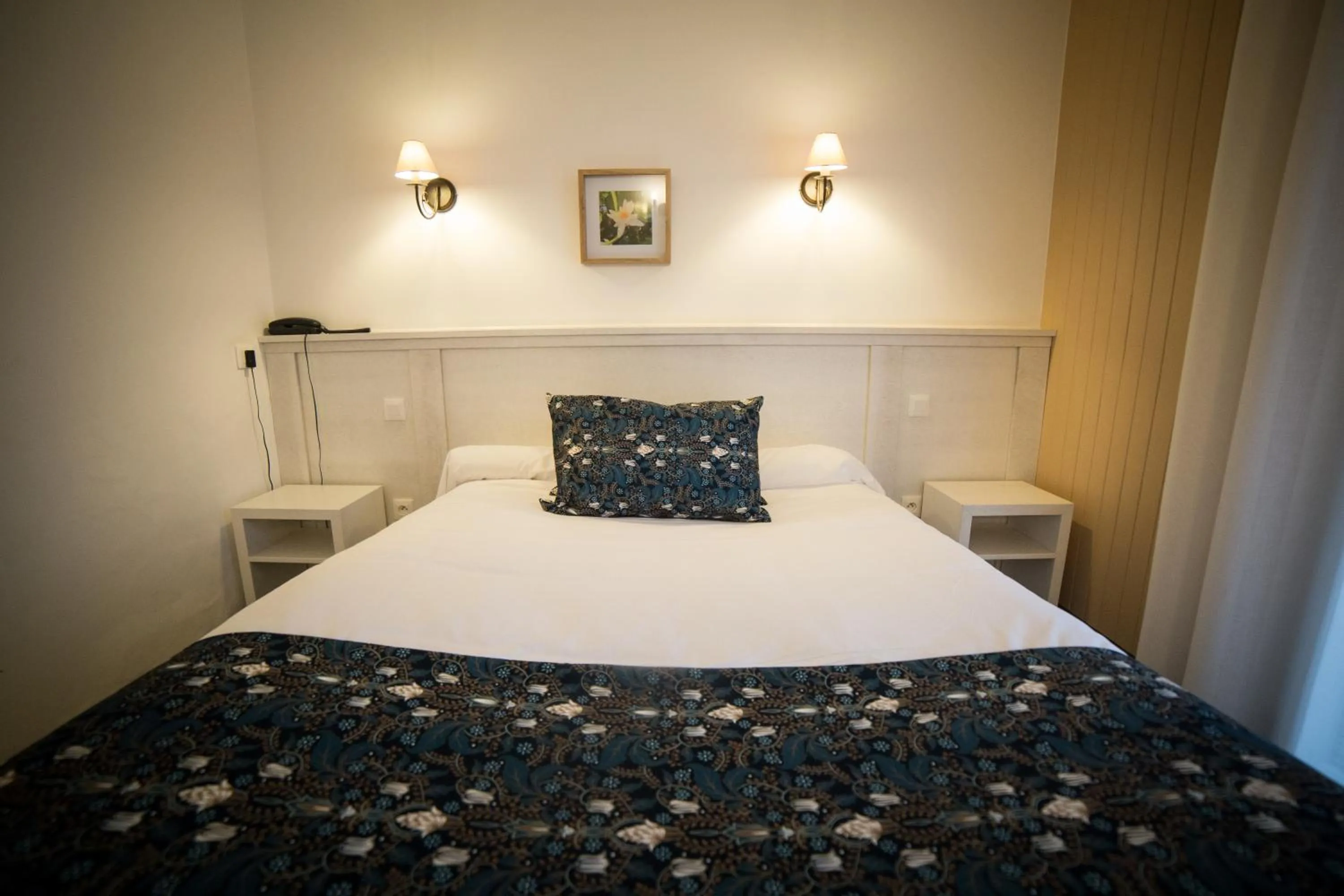 Bed in Le Catinat Fleuri