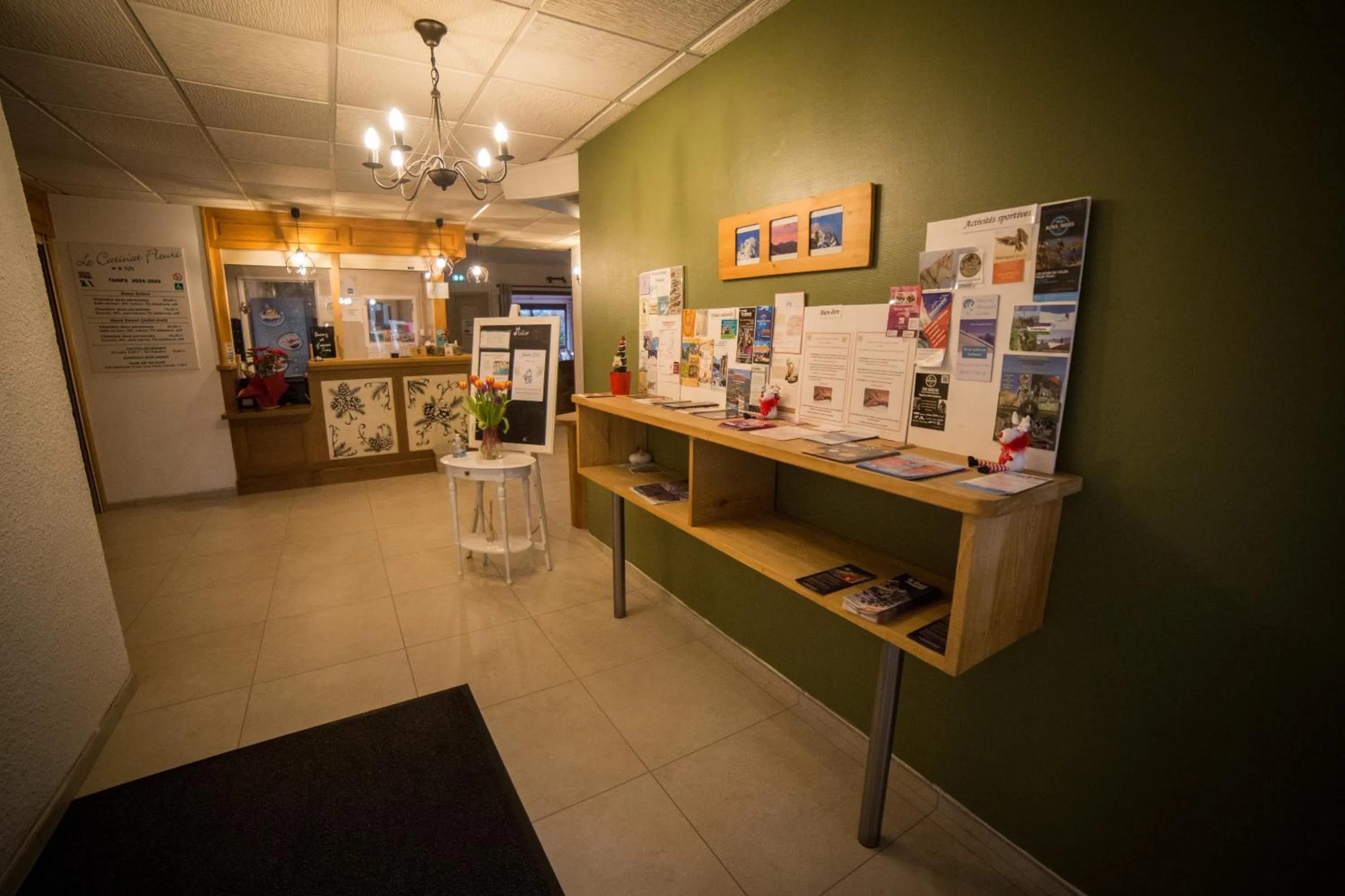 Lobby or reception in Le Catinat Fleuri