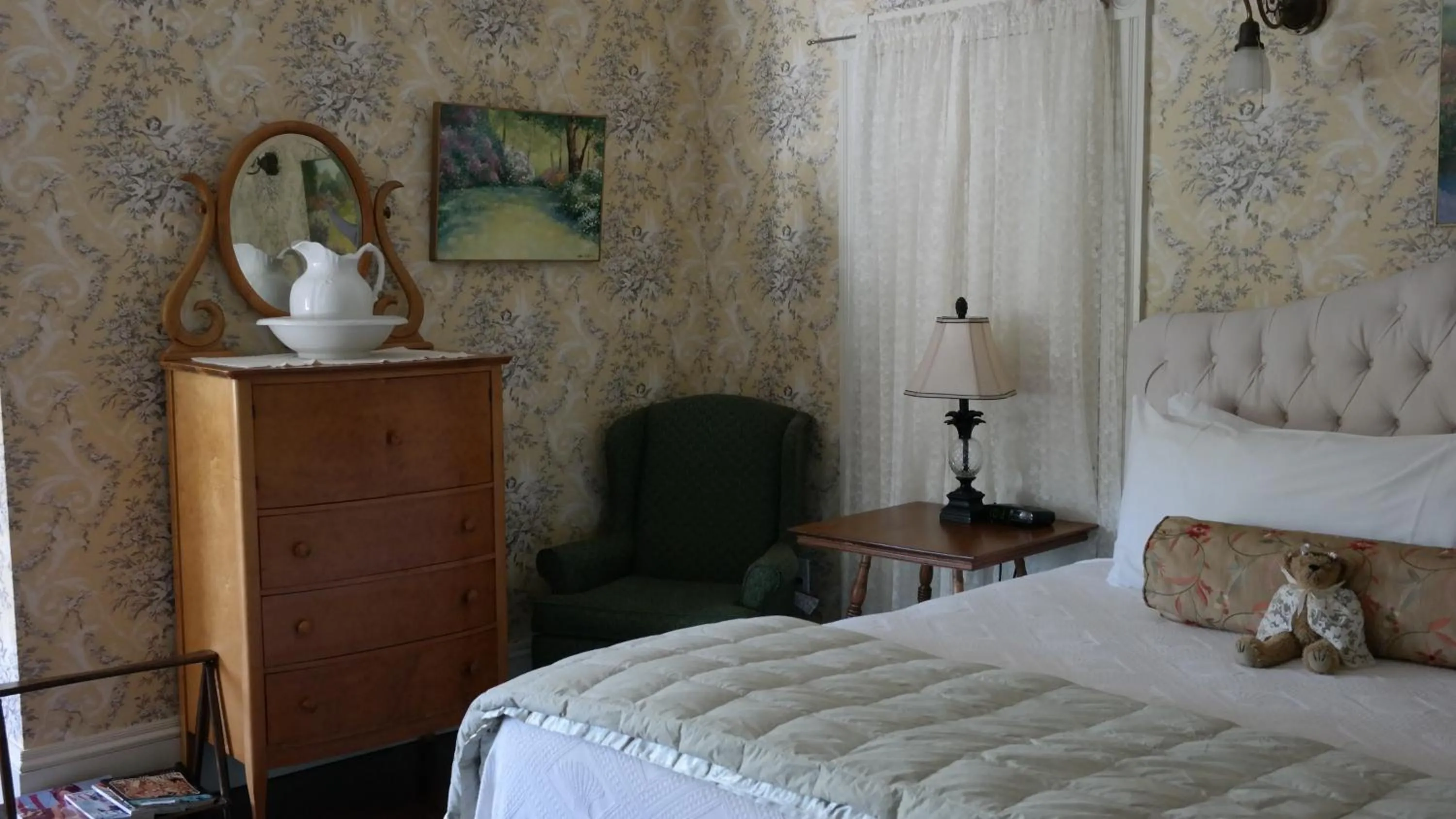 Decorative detail, Bed in Moseley Cottage Inn and The Town Motel