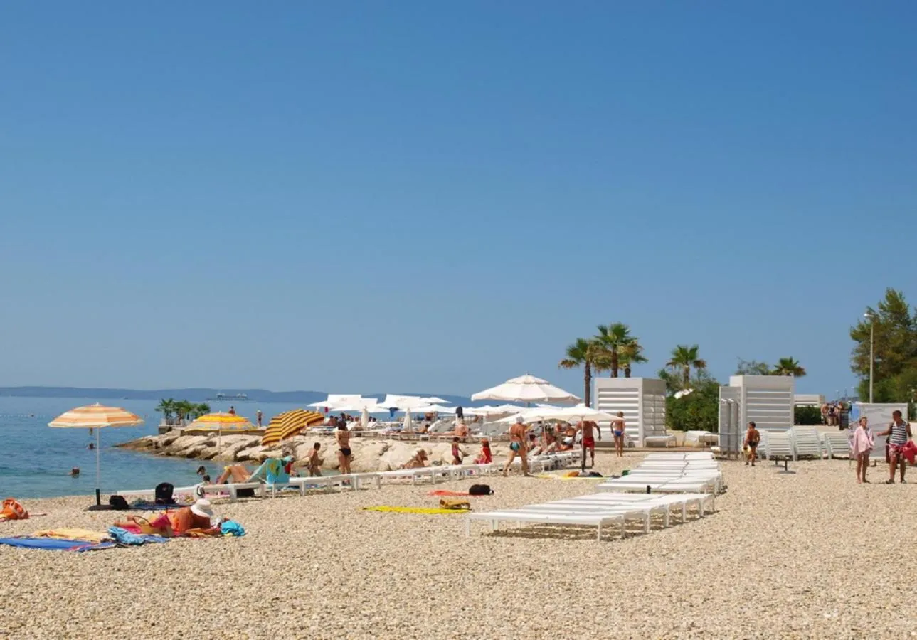 People in Aspalathos Centar Holiday - City center, a few minutes' walking distance to the UNESCO Palace, parking lot in front of the apartment