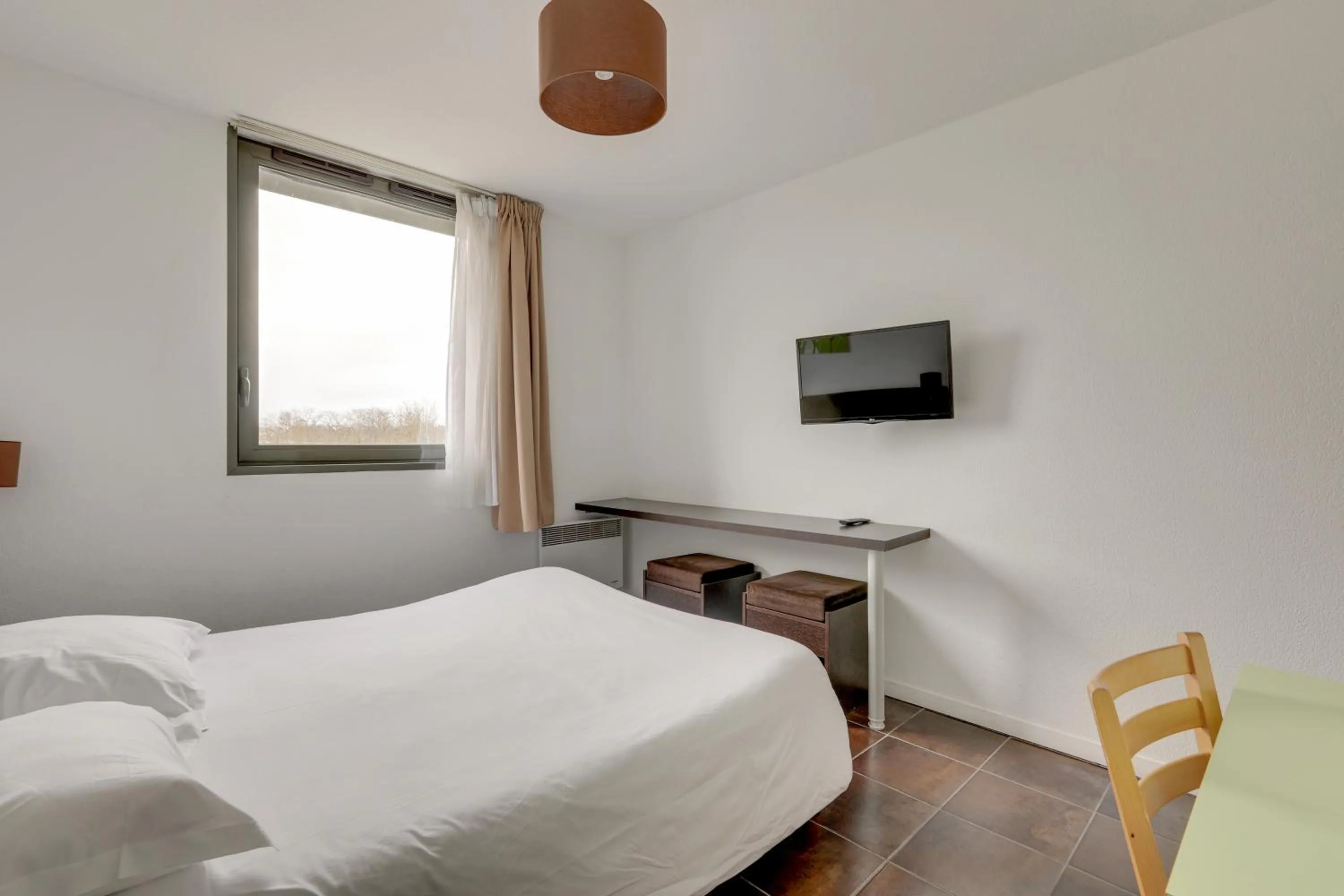 Bedroom in All Suites Appart Hôtel - Bordeaux Lac