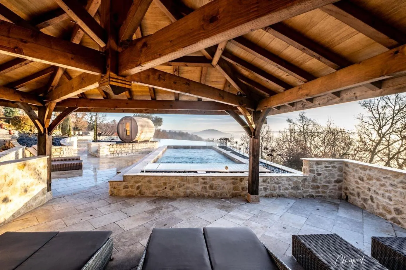 Swimming pool in Le Belvédère Hotel et Bien être