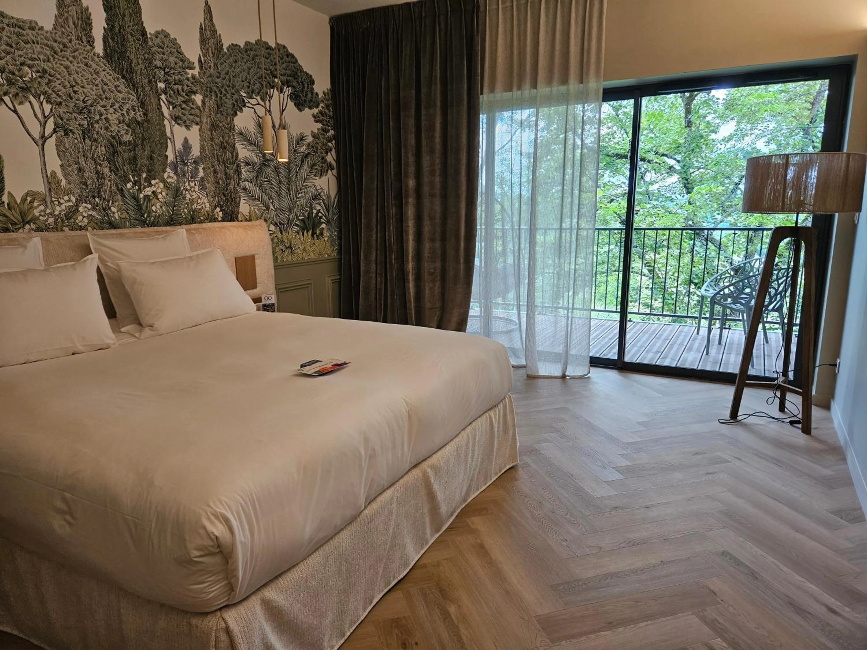 Bed in Le Belvédère Hotel et Bien être