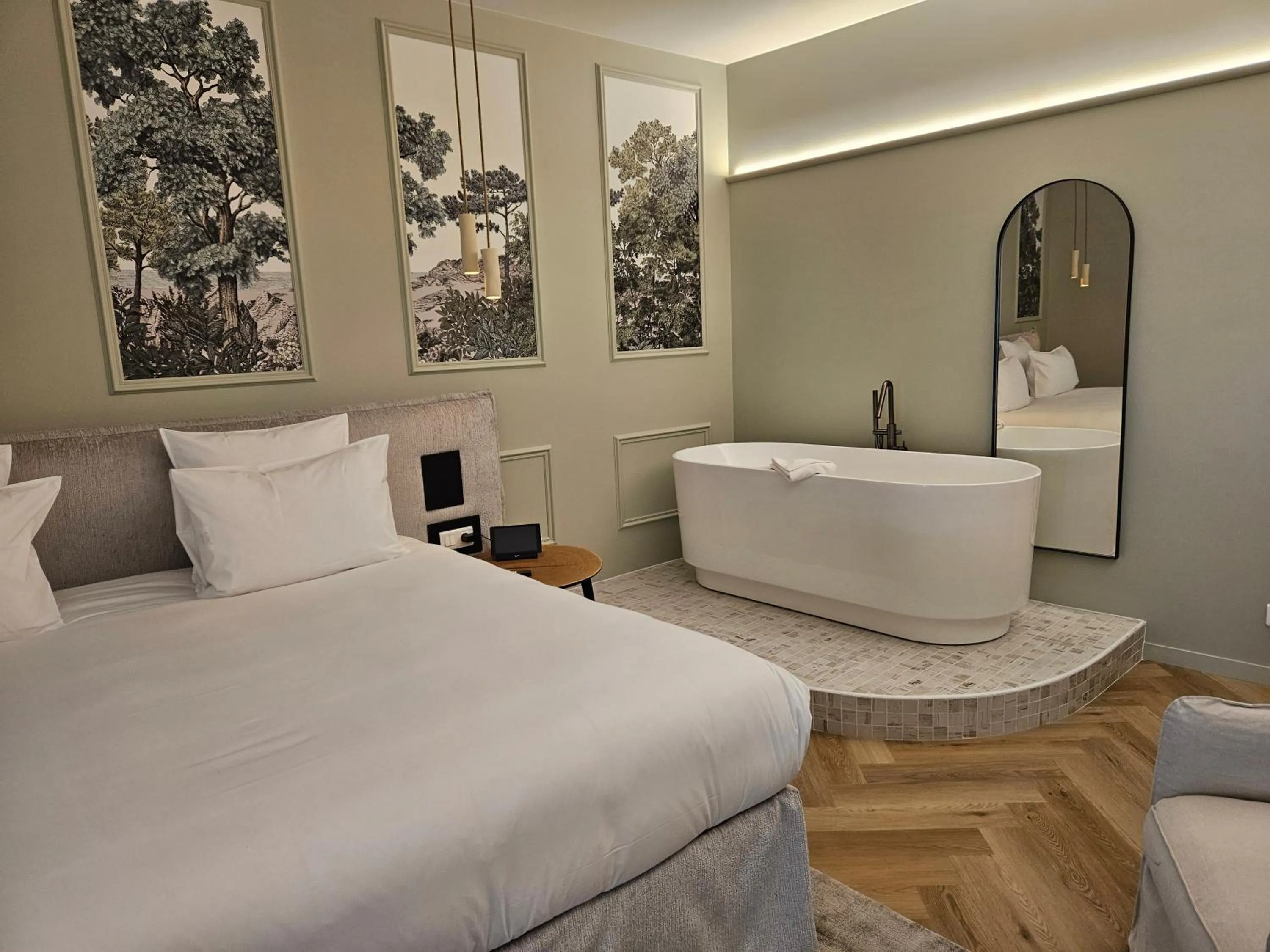 Bed in Le Belvédère Hotel et Bien être