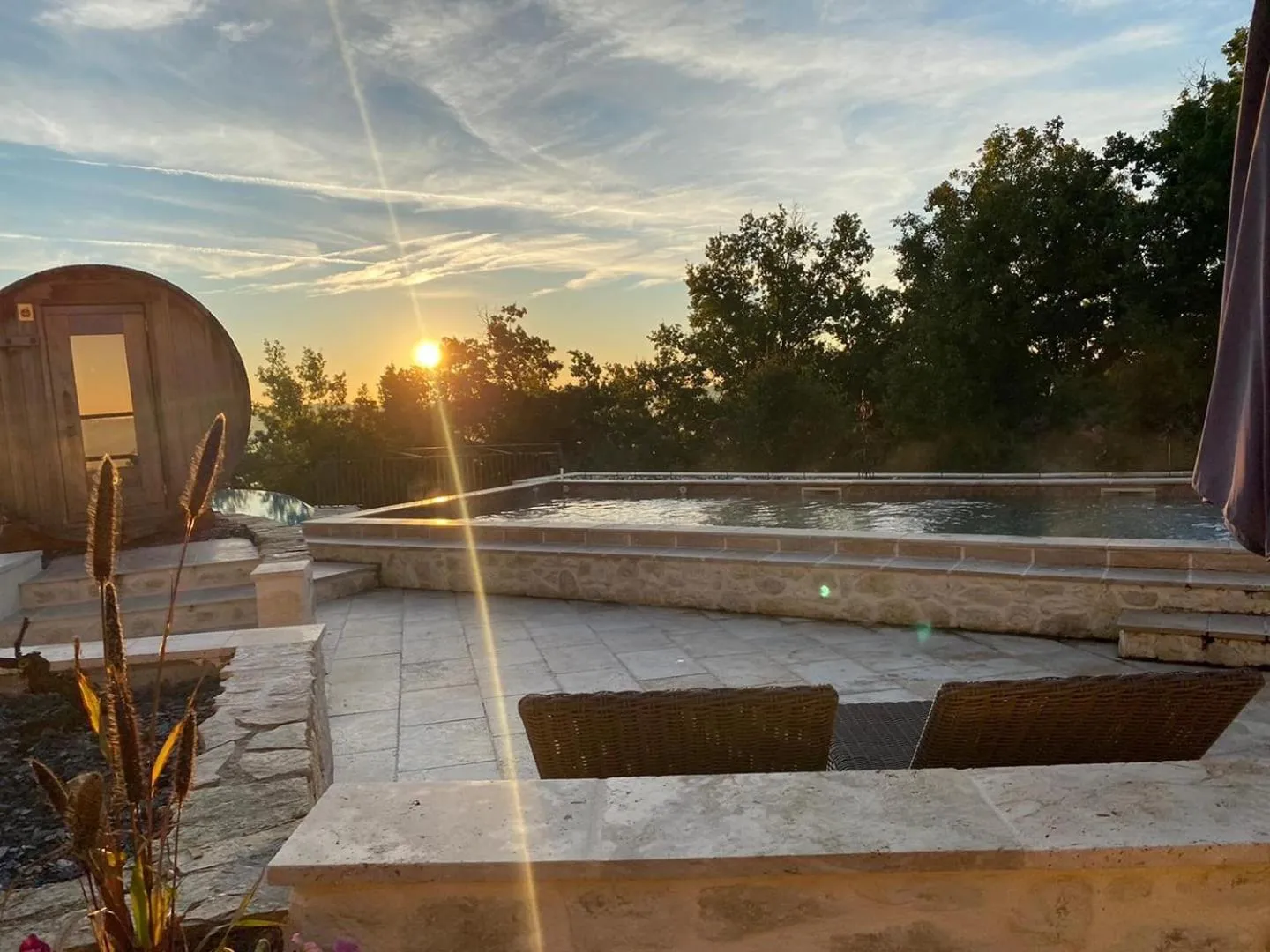 Swimming pool in Le Belvédère Hotel et Bien être