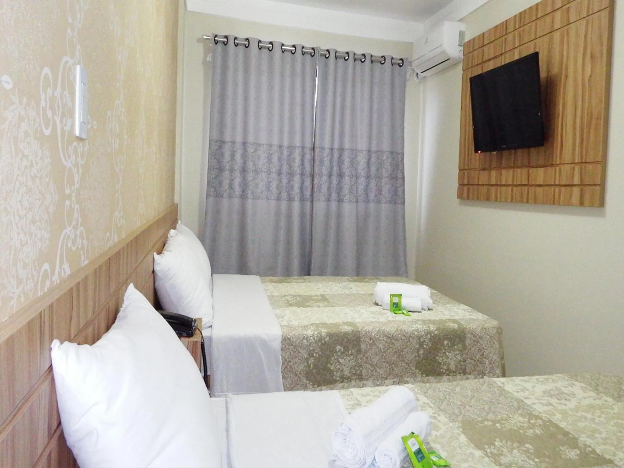 Bed in Coral Palace Hotel