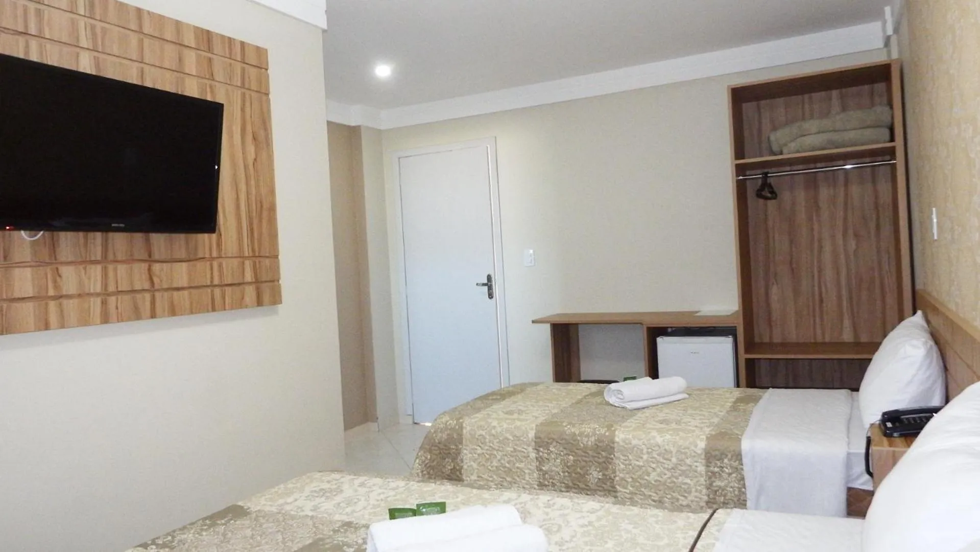 Bed in Coral Palace Hotel